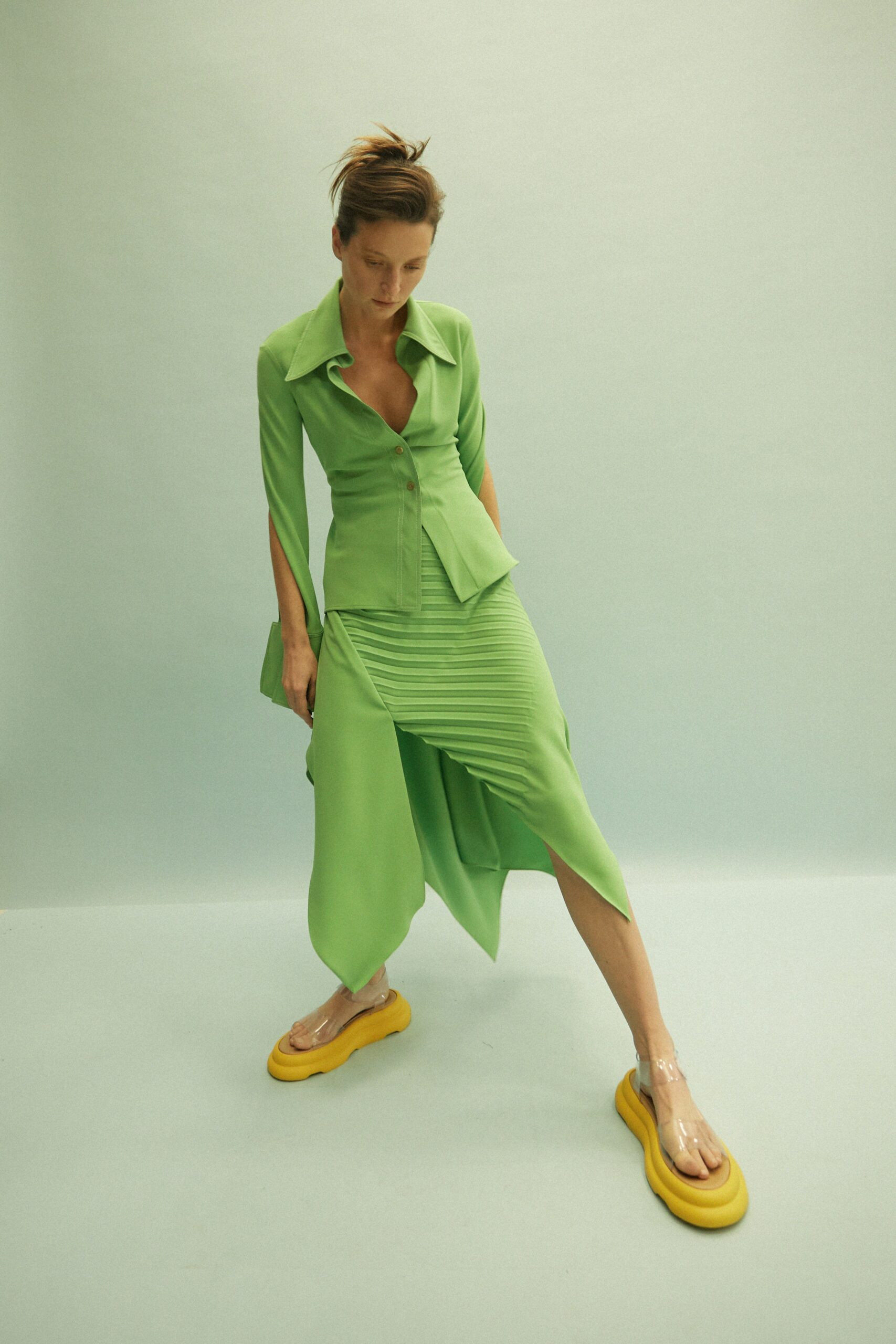 green silk asymmetric fitted pleated skirt