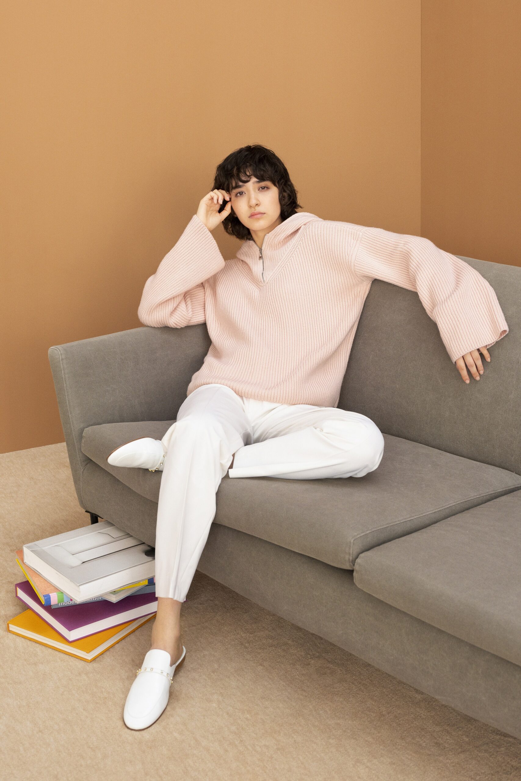 pink relaxed sweater with white pants