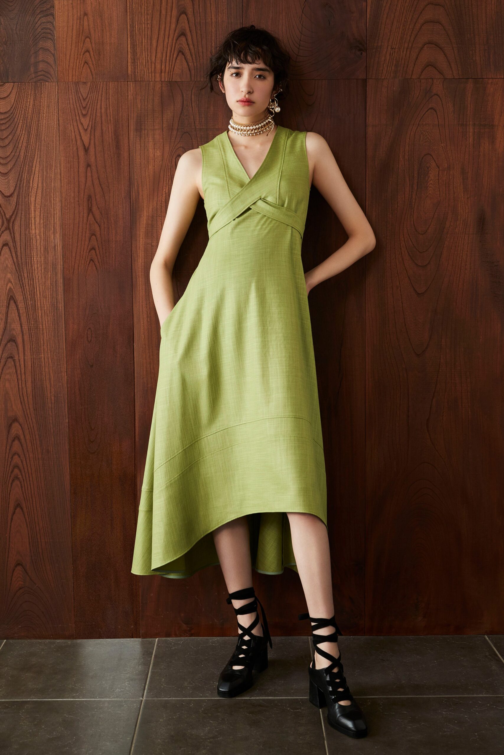green midi dress with black shoes