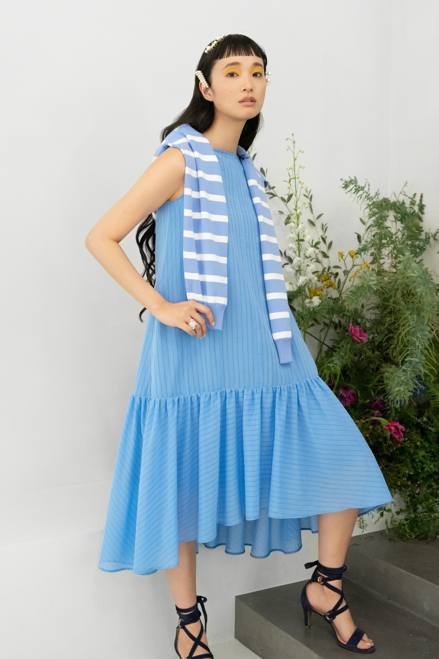 blue pleated midi dress with striped sweater