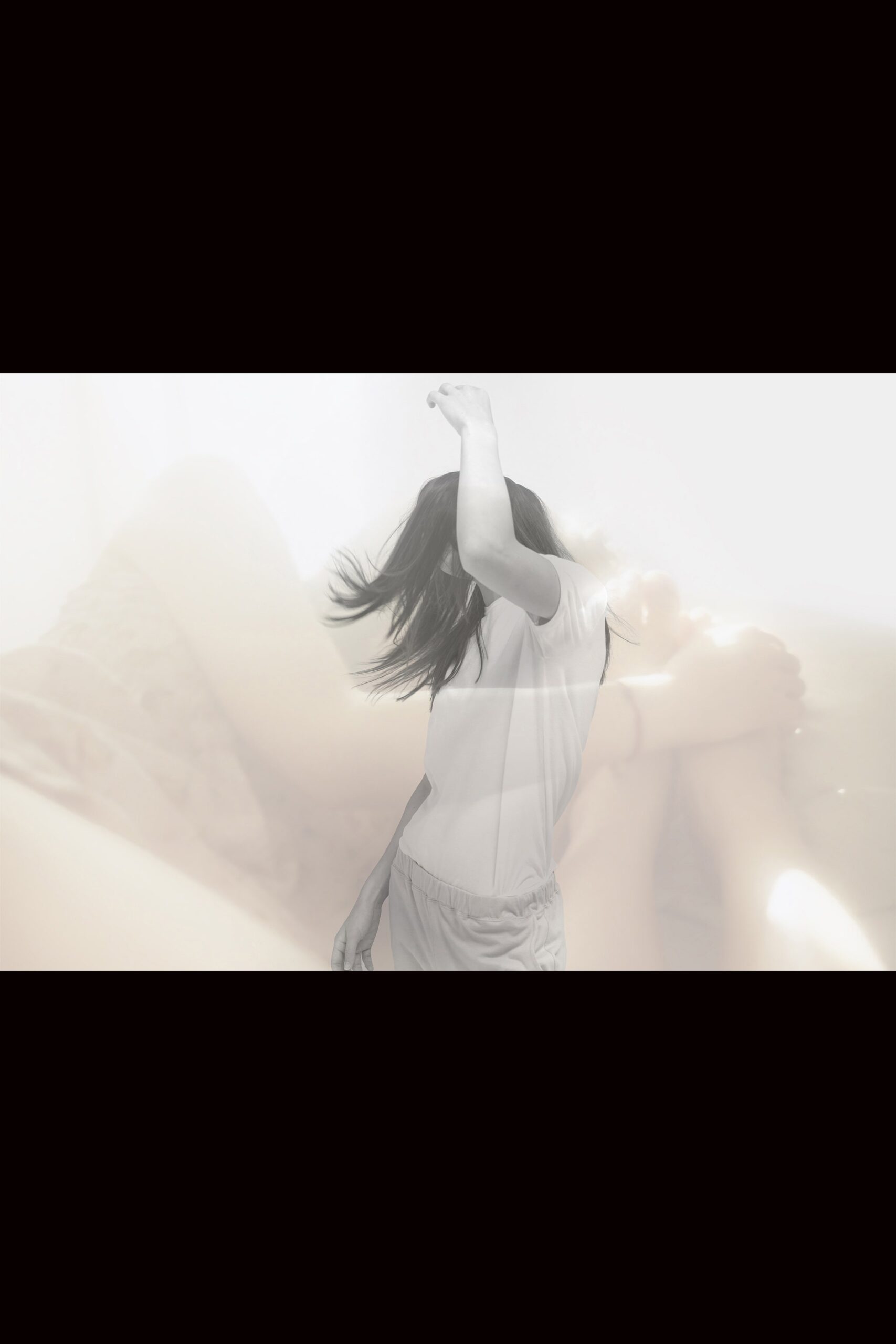 relaxed white top and gray shorts