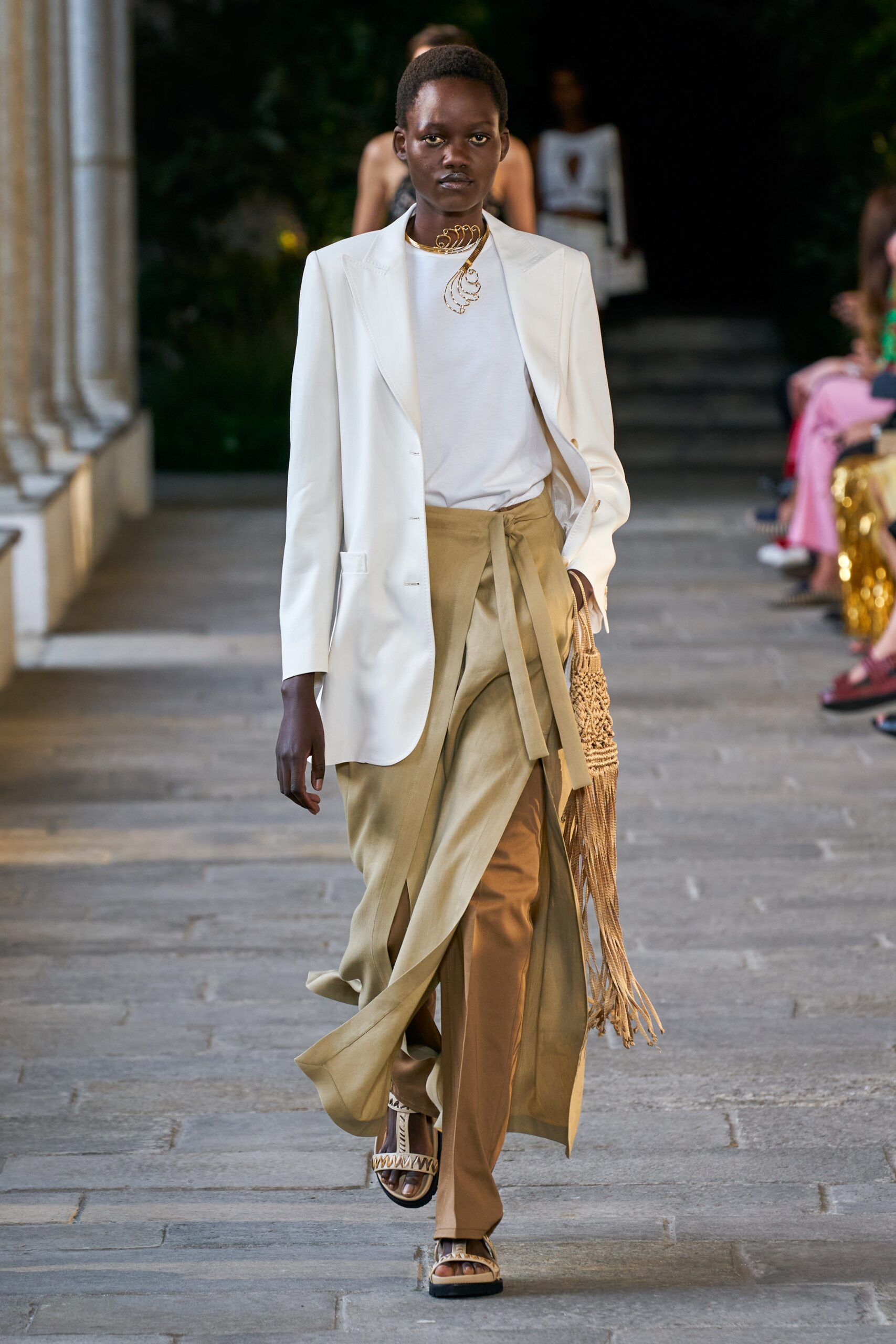 white tailored blazer with beige skirt