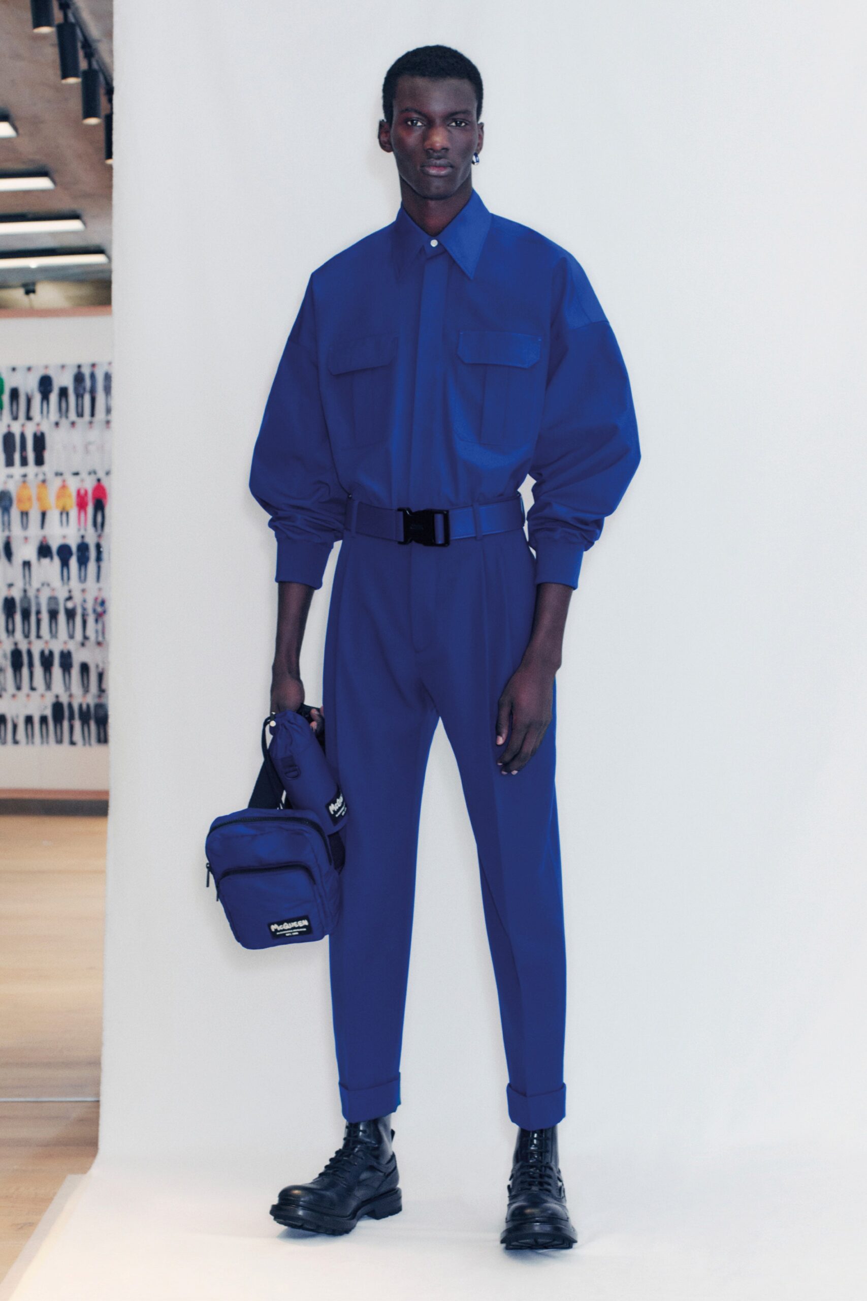 blue relaxed jumpsuit with bag