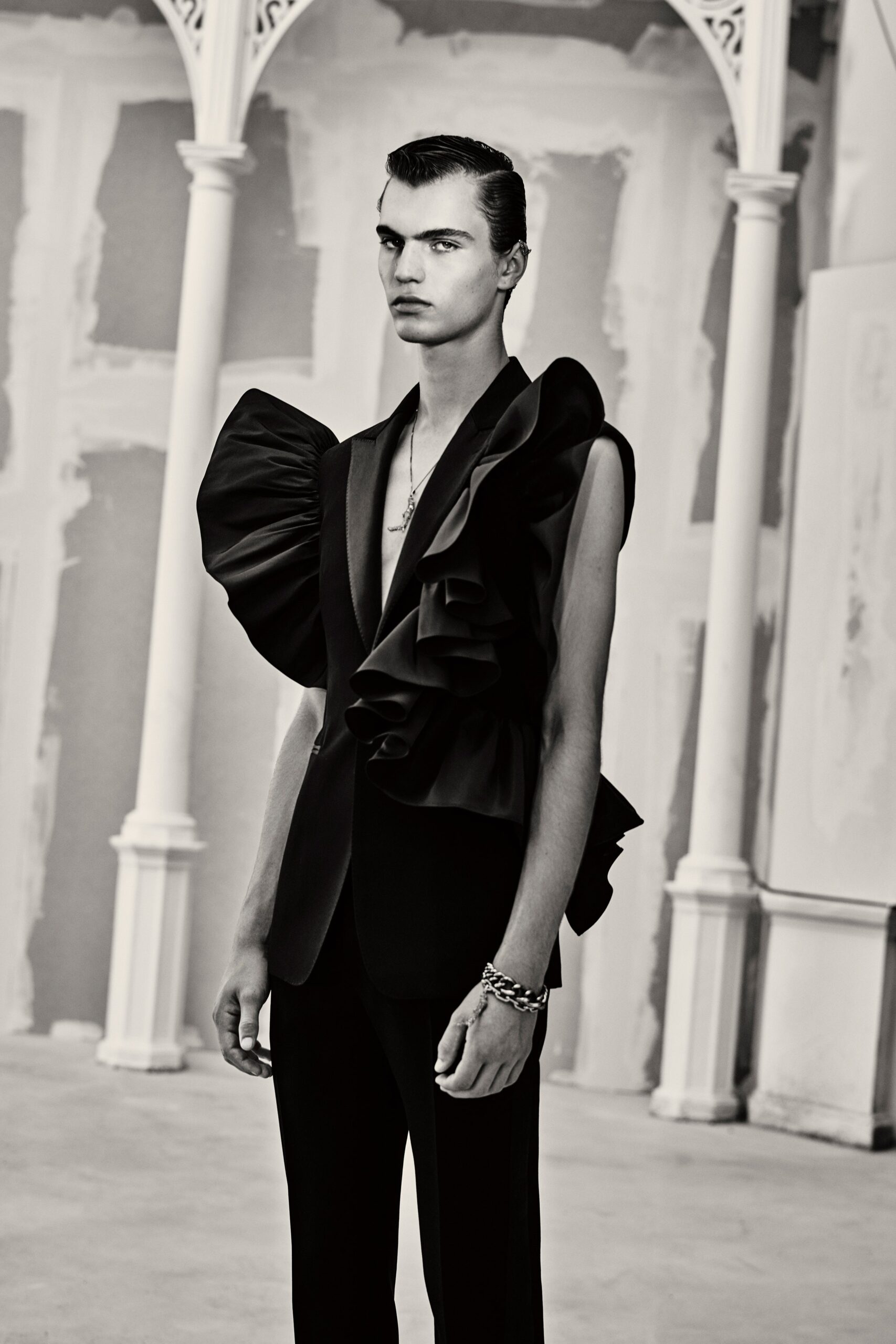 black ruffled blazer and pants