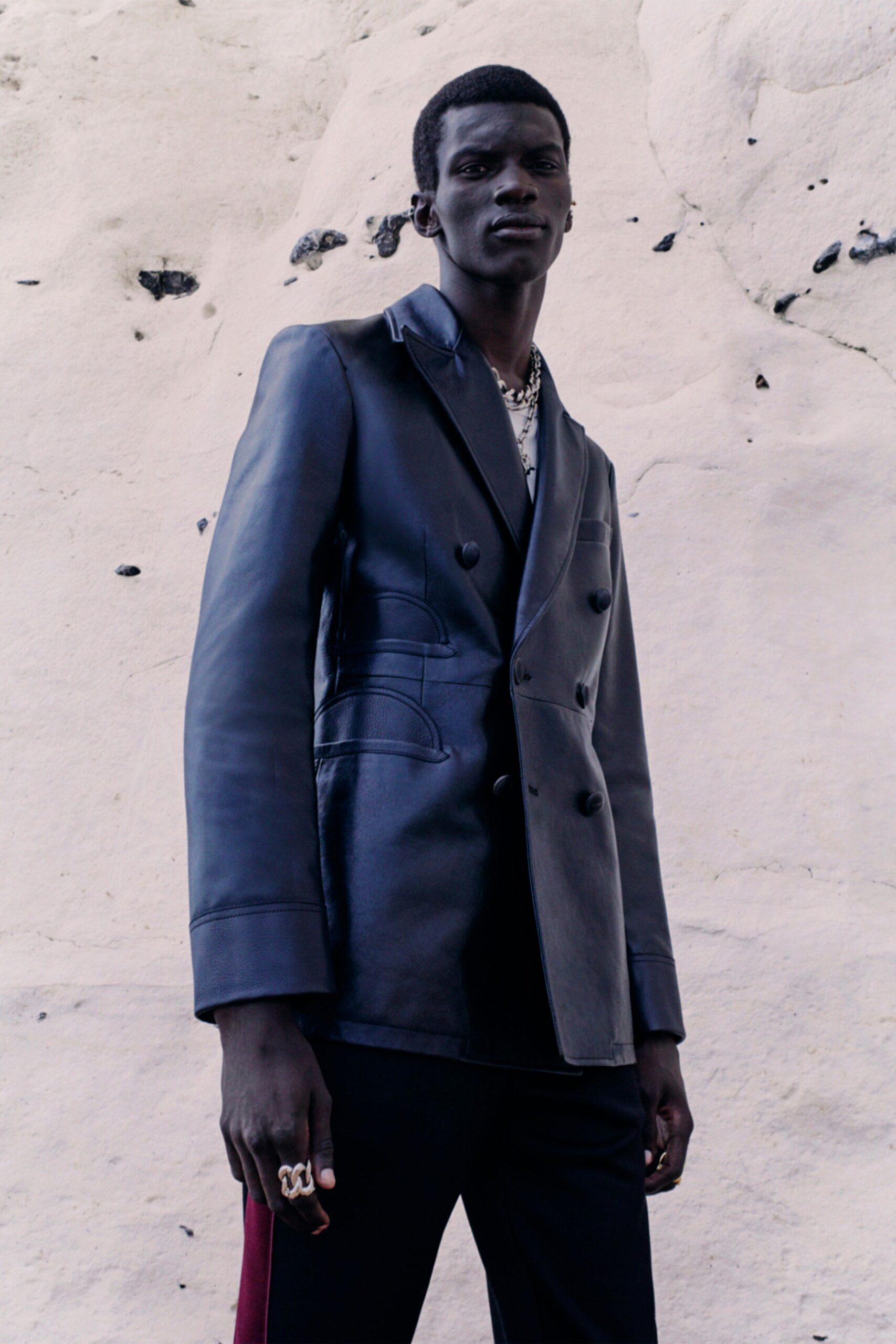 black leather tailored blazer and slim pants