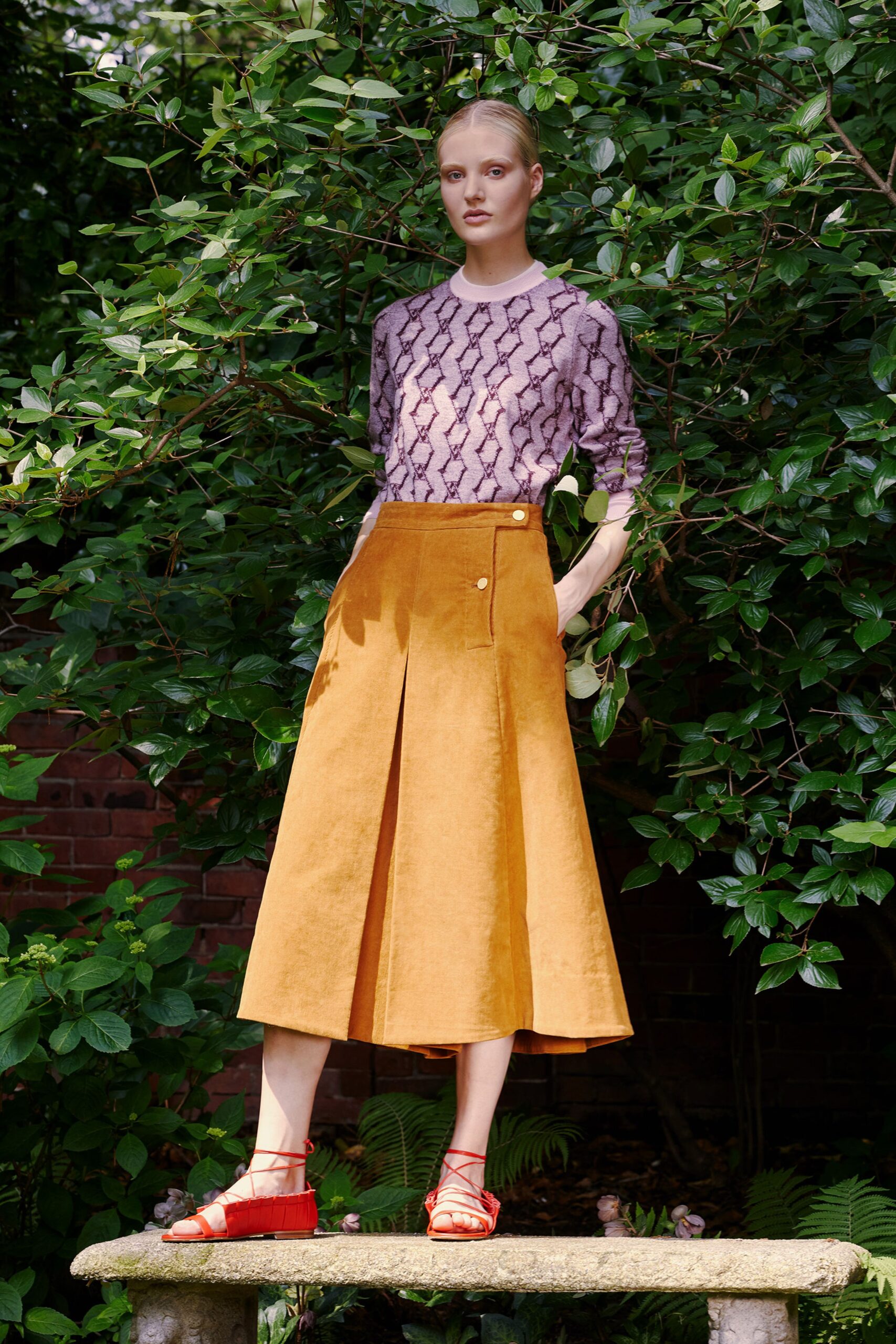 purple silk top with yellow skirt
