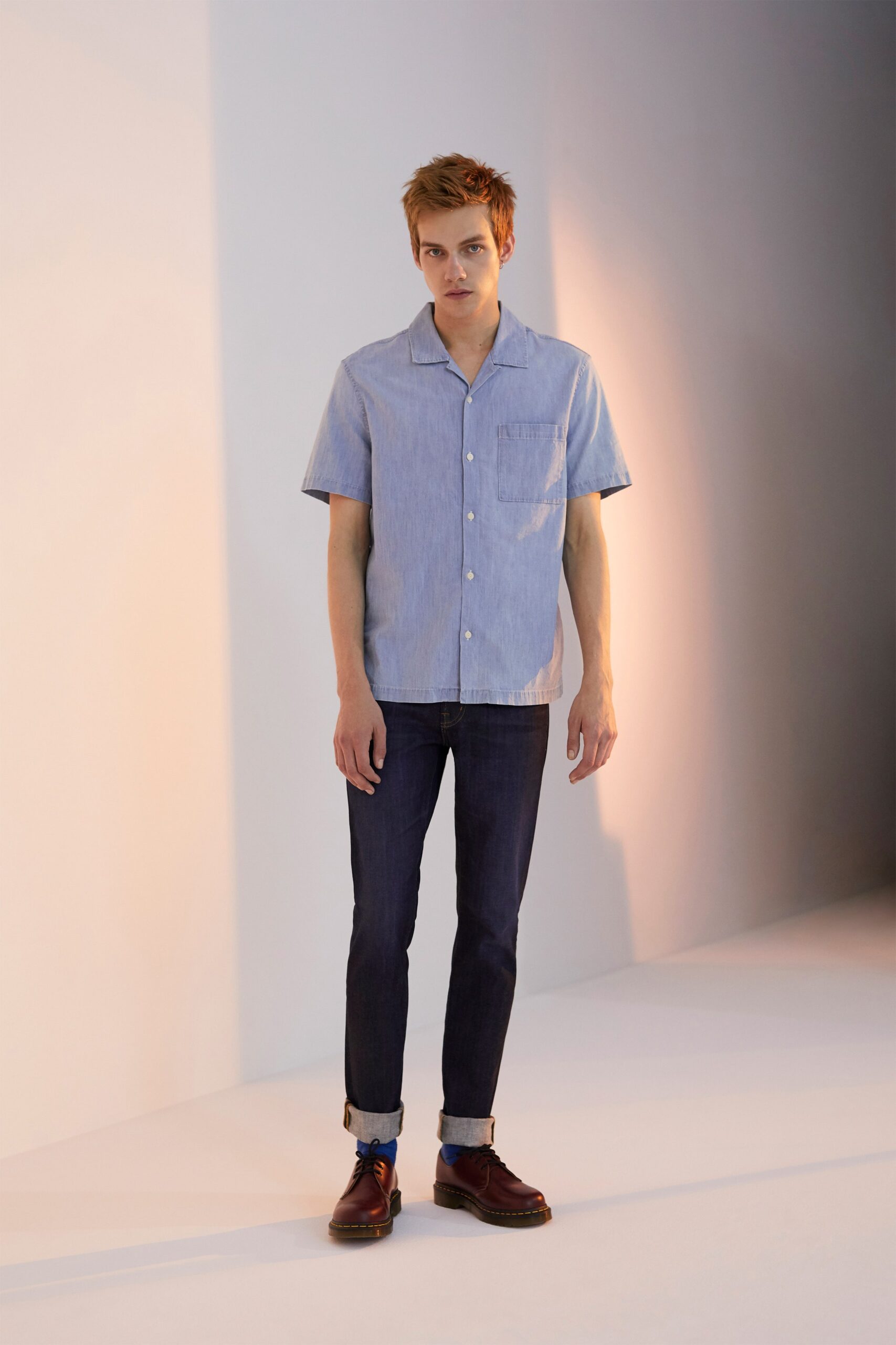 blue cotton short-sleeve shirt with jeans