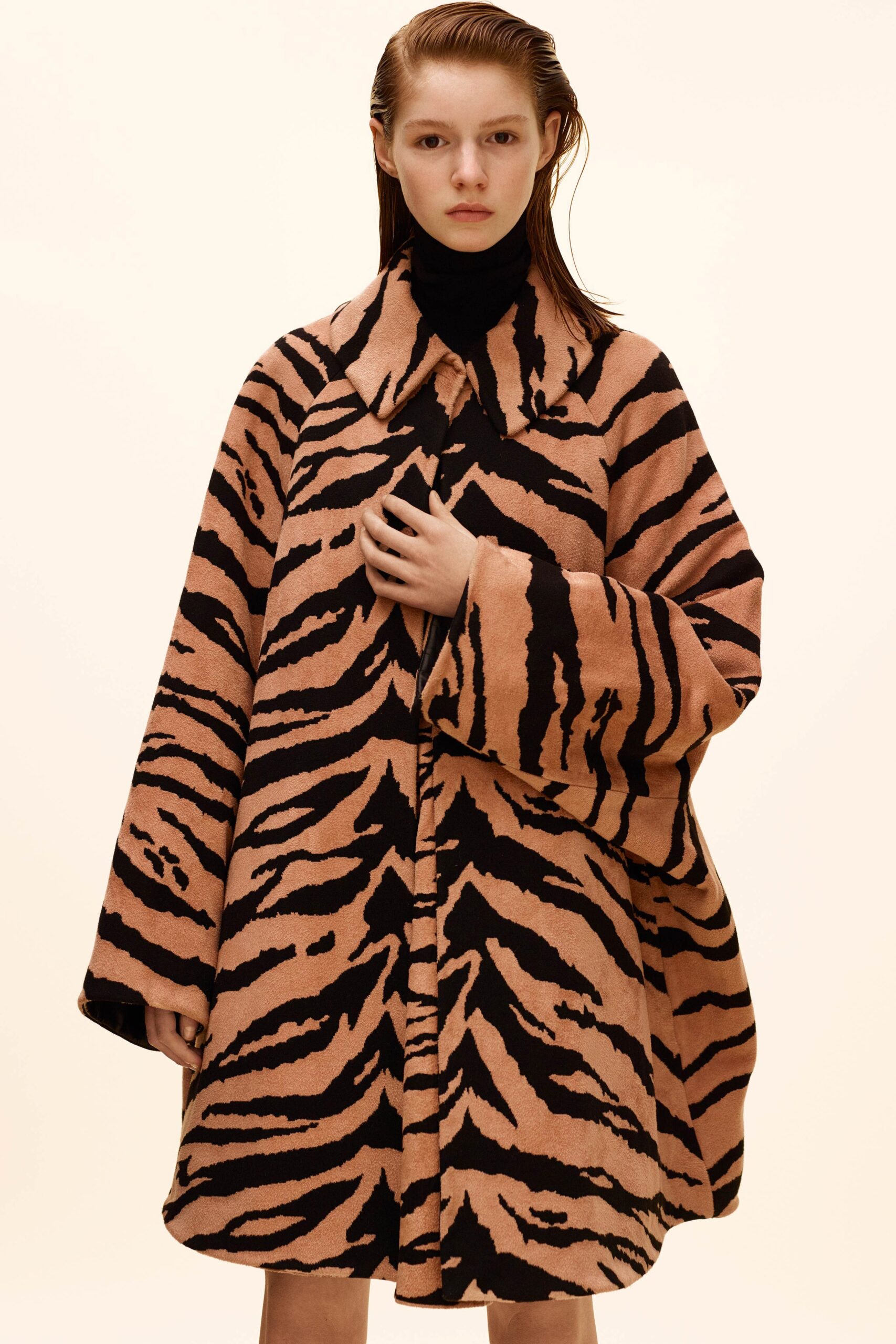 orange and black animal-print coat