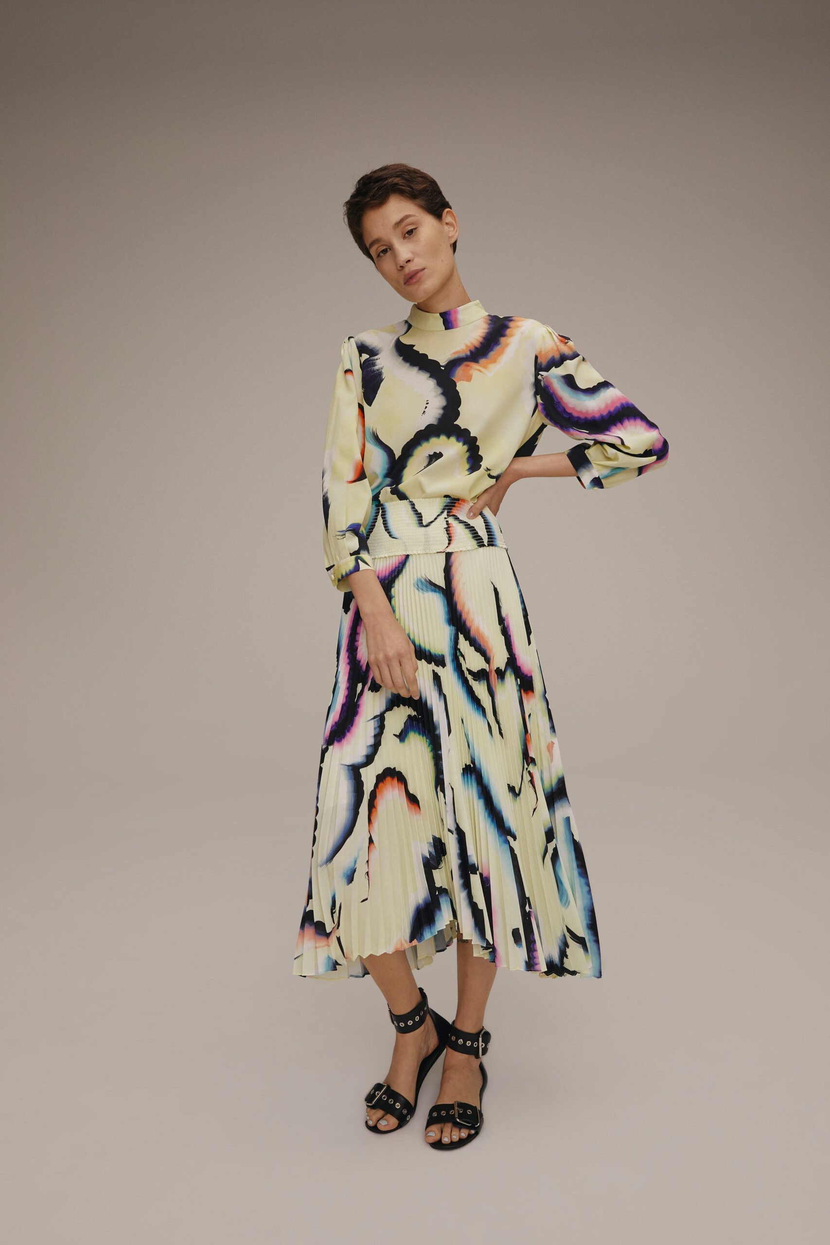 colorful pleated top and midi skirt