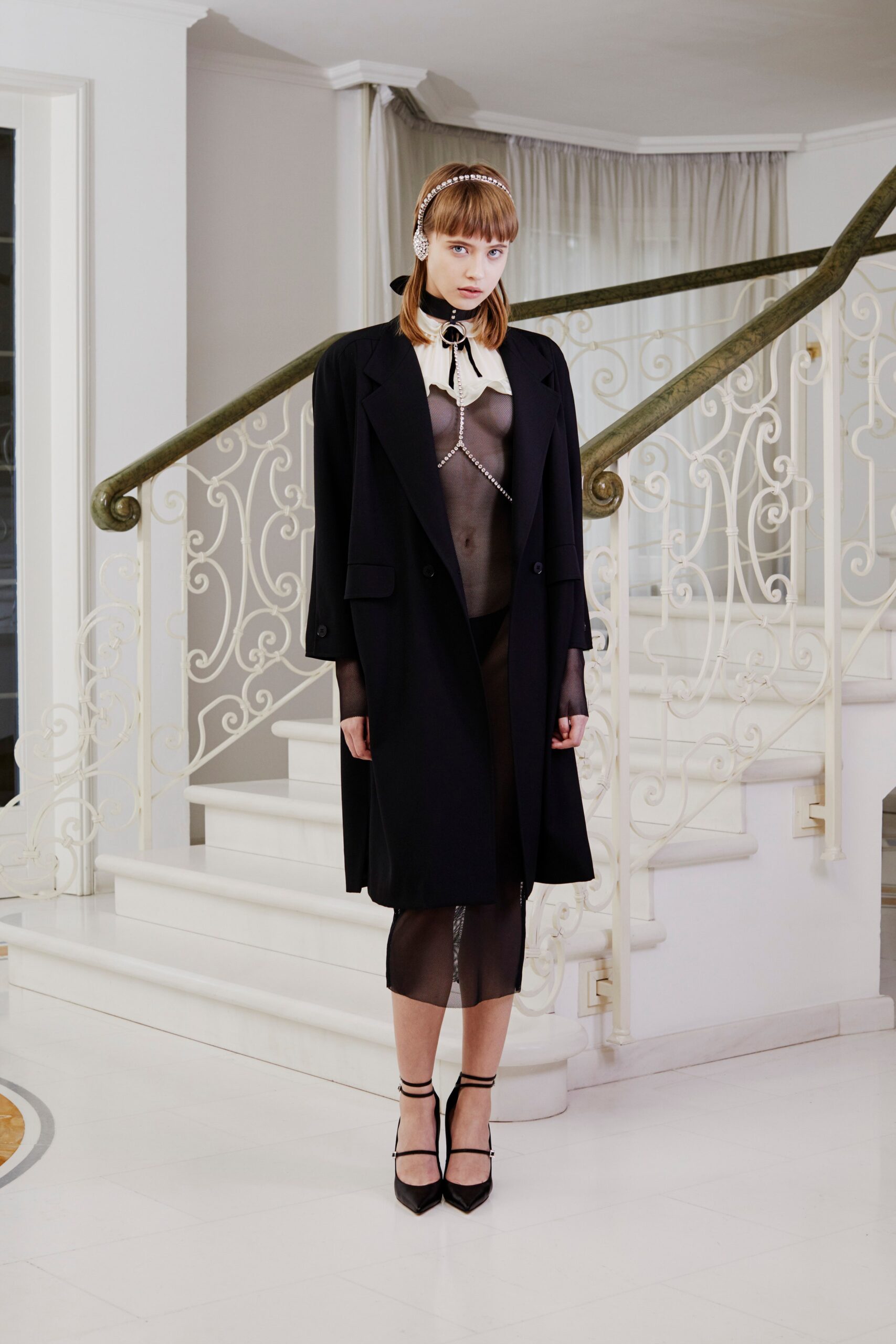 black wool long-sleeve collared relaxed buttoned coat