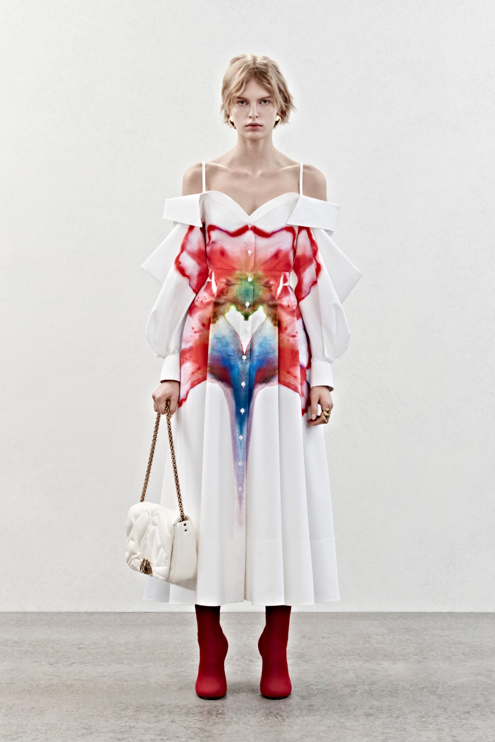 white midi dress with red accents