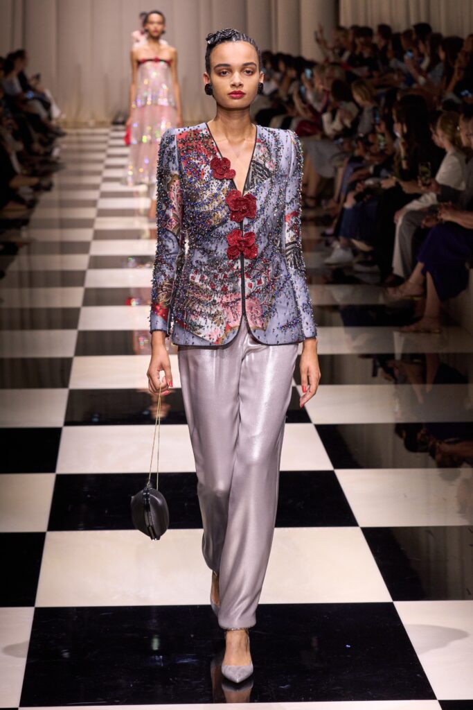 multi-colored embroidered blazer with gray pants