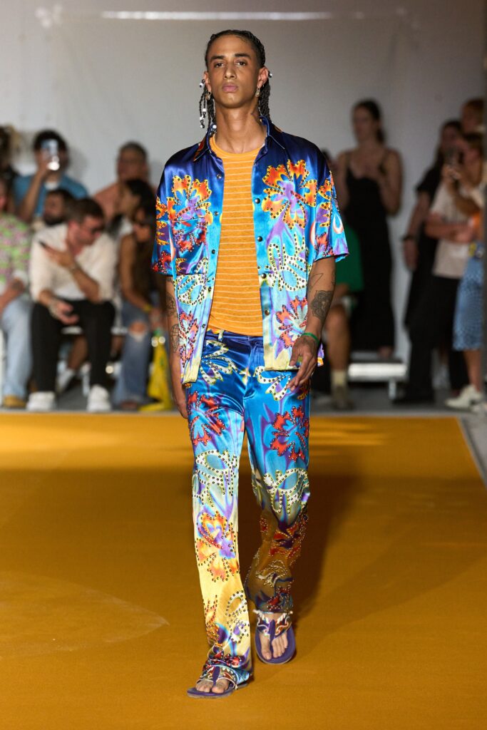 A relaxed-fit multicolor printed shirt paired with matching pants, perfect for a vibrant summer look.