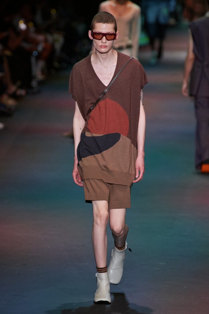 A relaxed brown multicolor top with a V-neck and matching printed shorts.