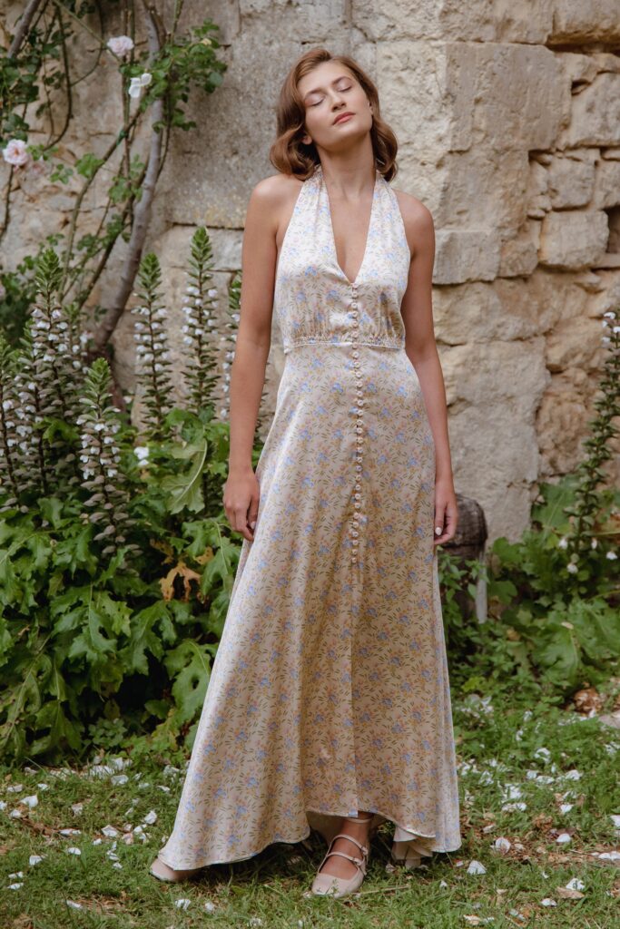 A relaxed multicolor silk sleeveless dress with a V-neckline and flared silhouette.