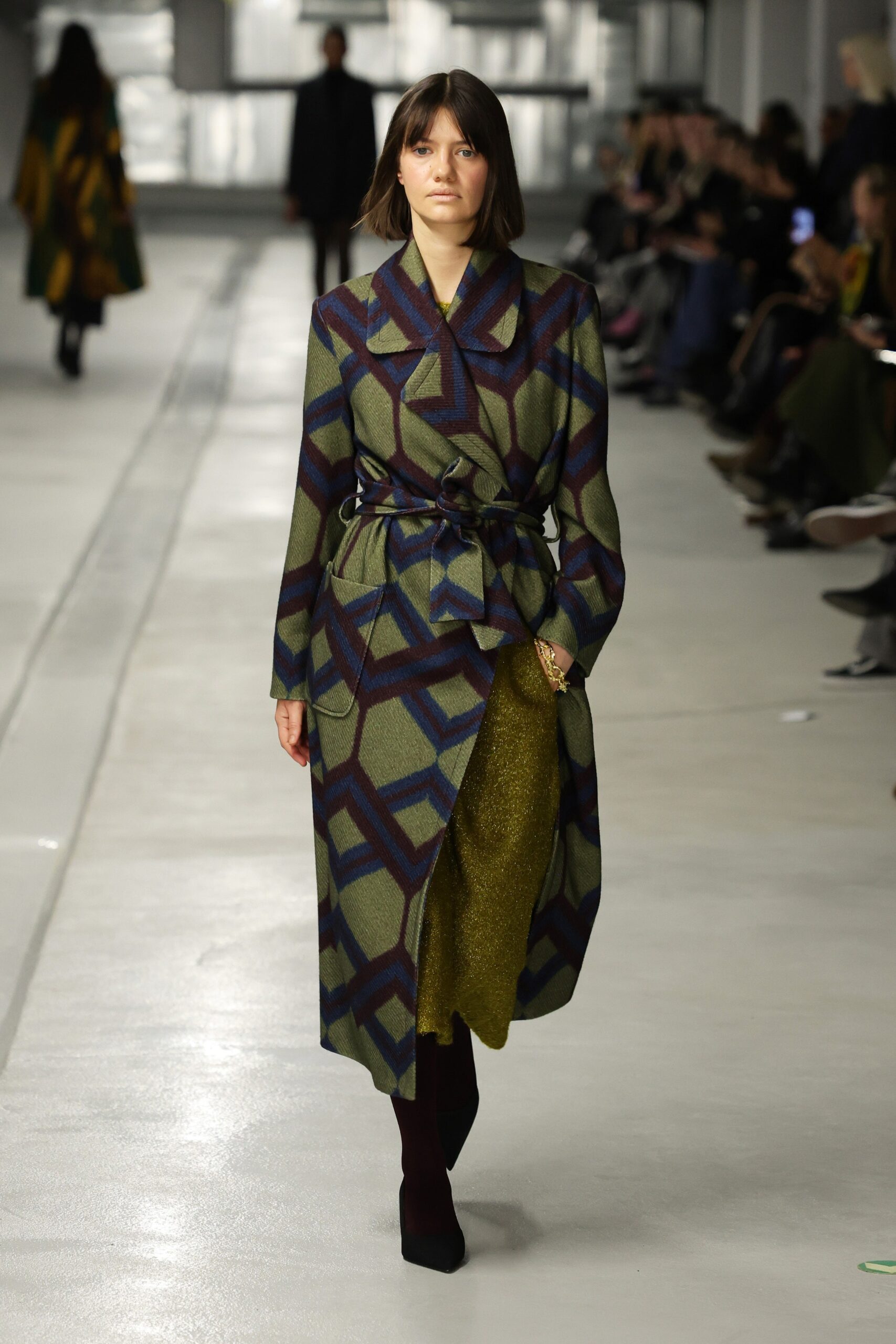 printed wool coat and gold dress