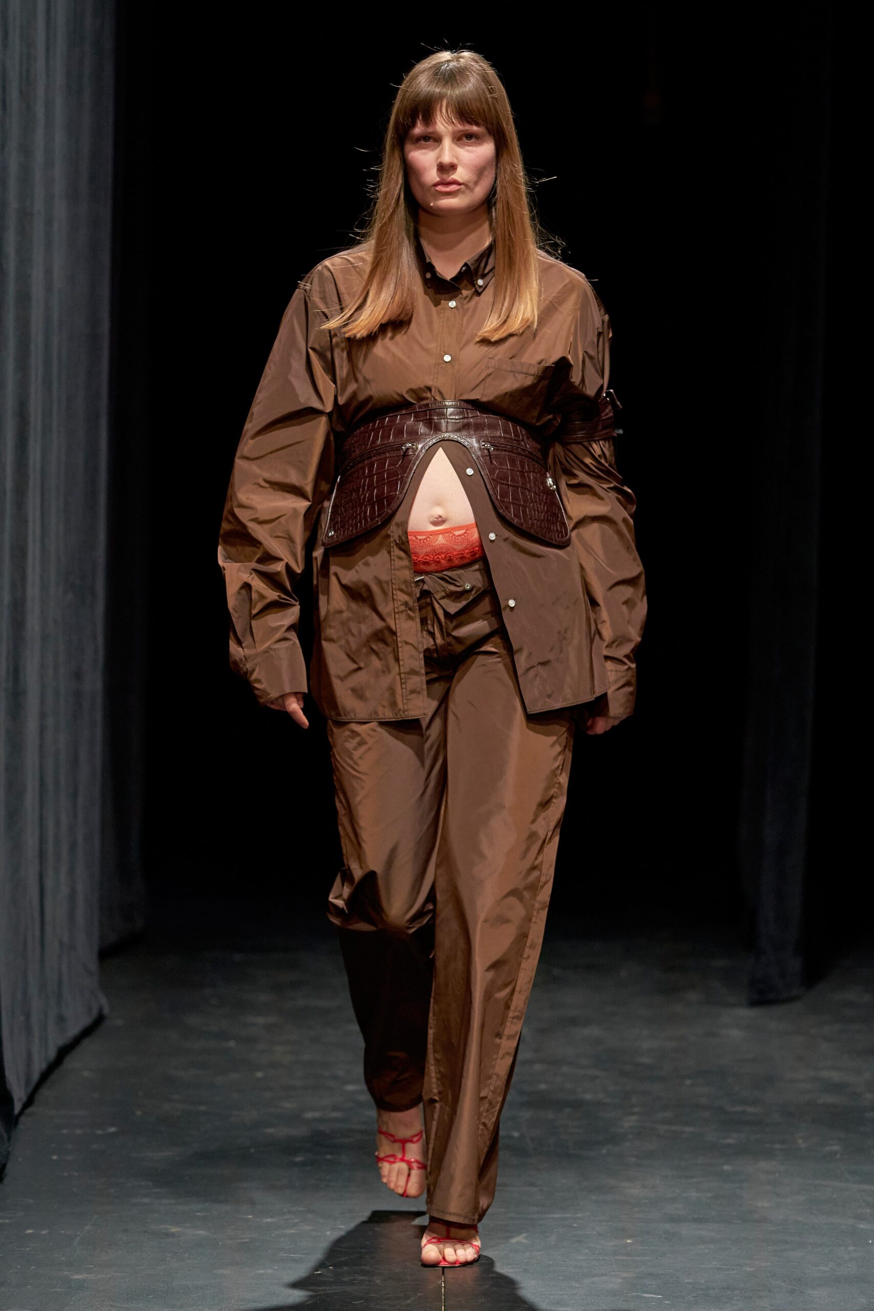 A relaxed brown cotton long-sleeve shirt with collared design paired with matching pants.