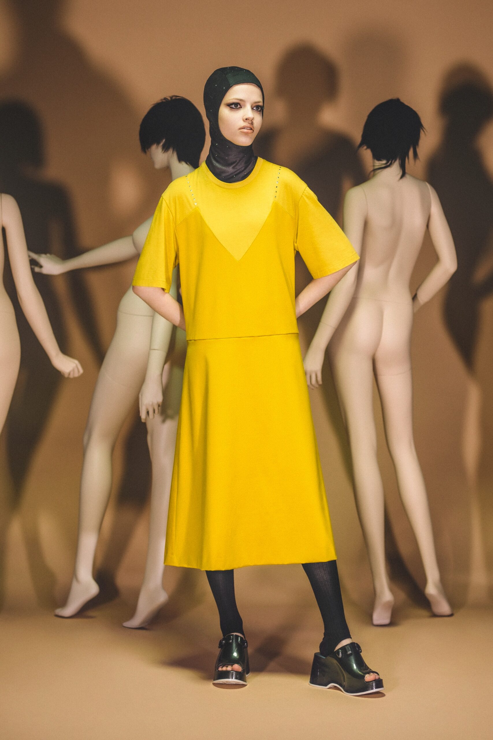 A relaxed yellow dress with short sleeves and a V-neckline.