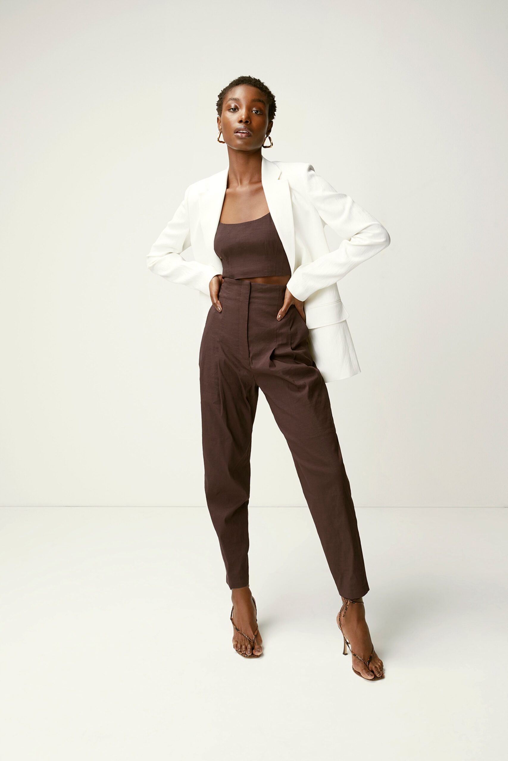 brown slim high-waisted pleated pants