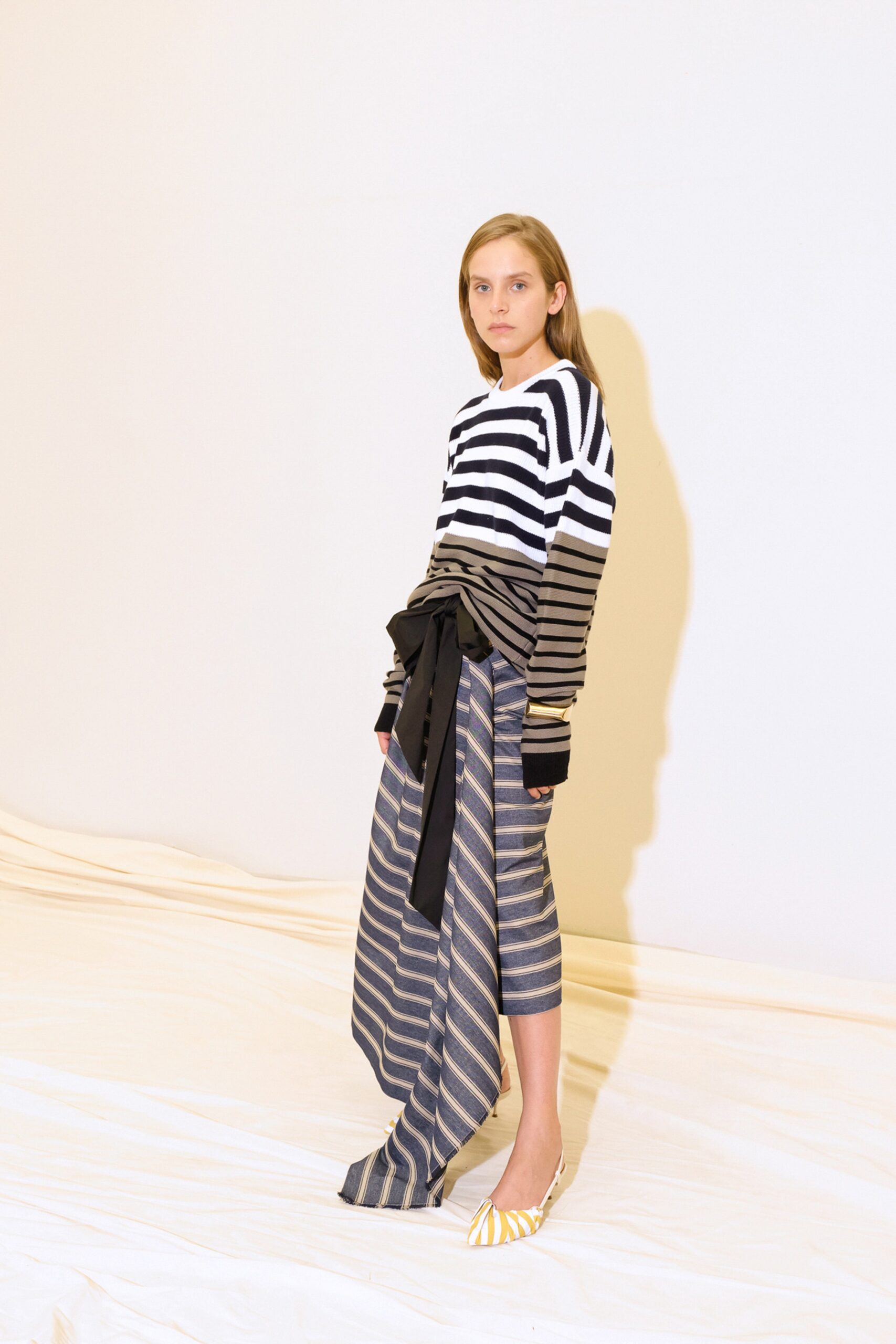 black long-sleeve collared relaxed striped top