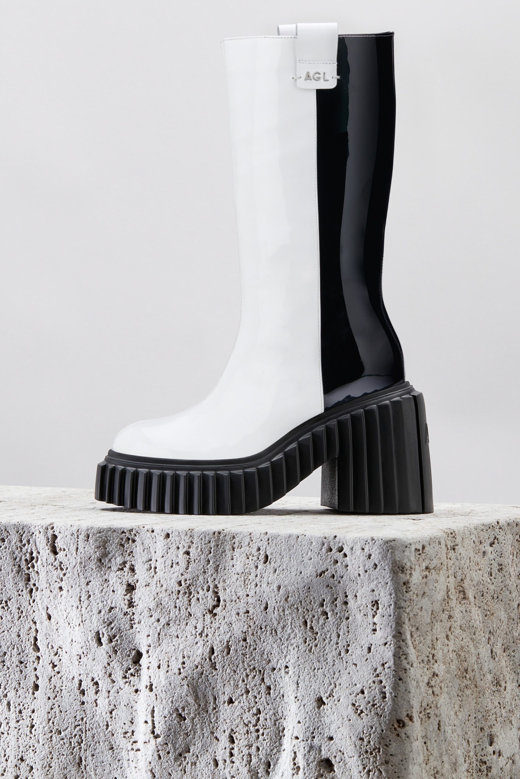 black and white vinyl boots