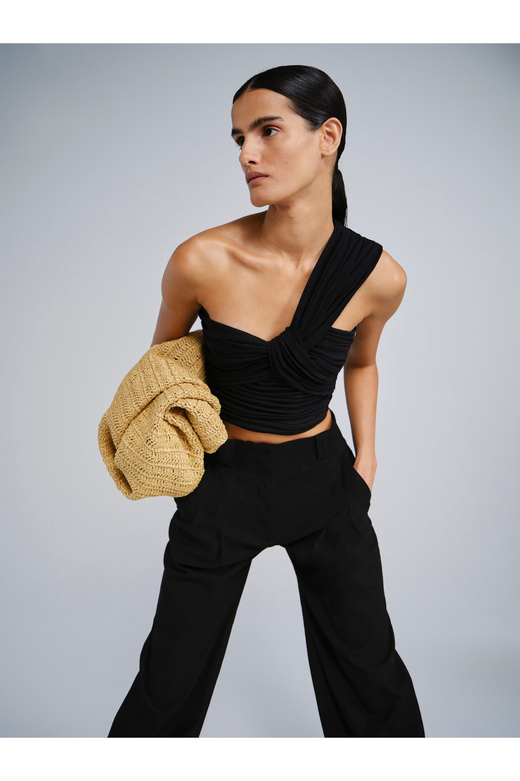 black fitted top with yellow cardigan