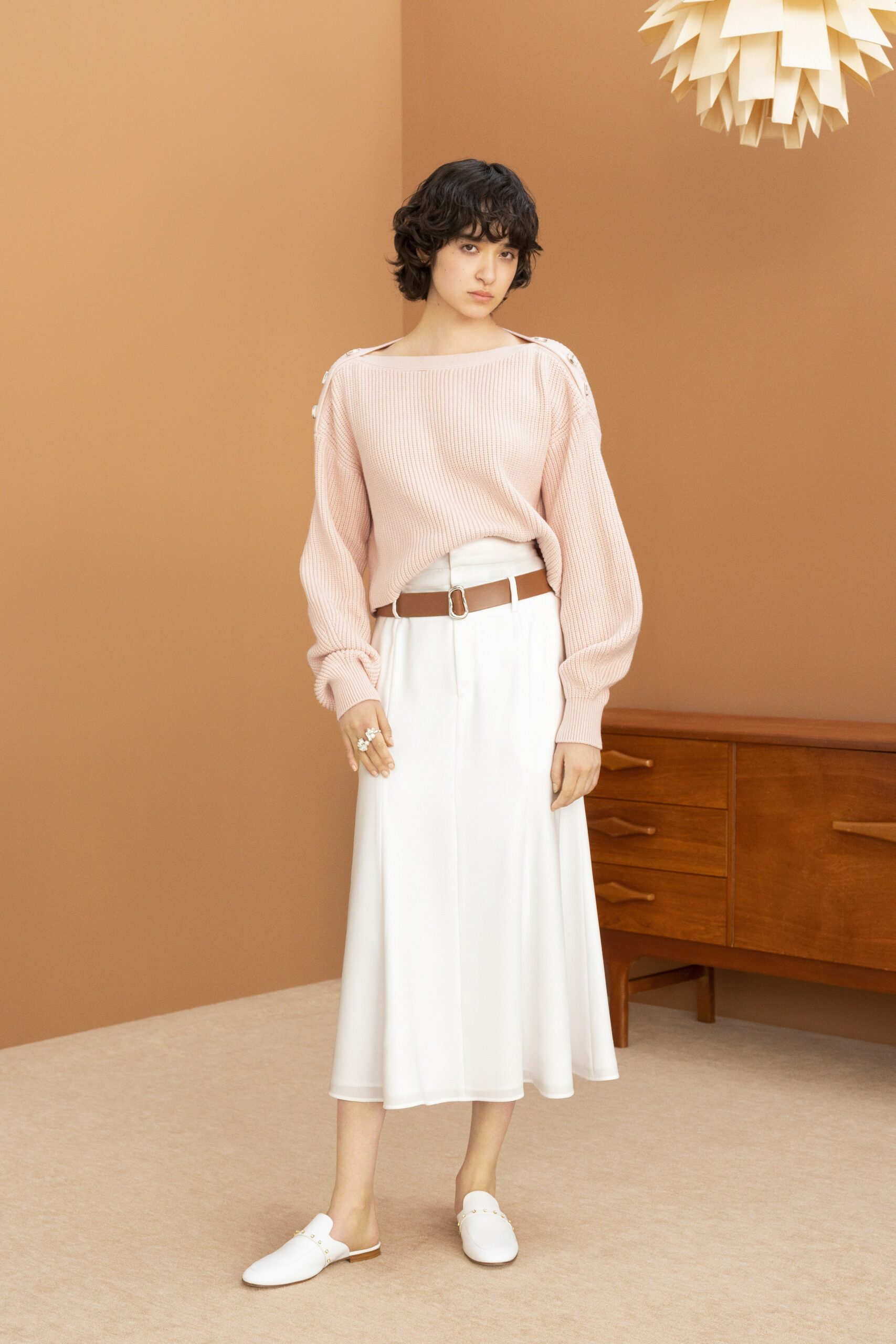 pink relaxed sweater with white midi skirt