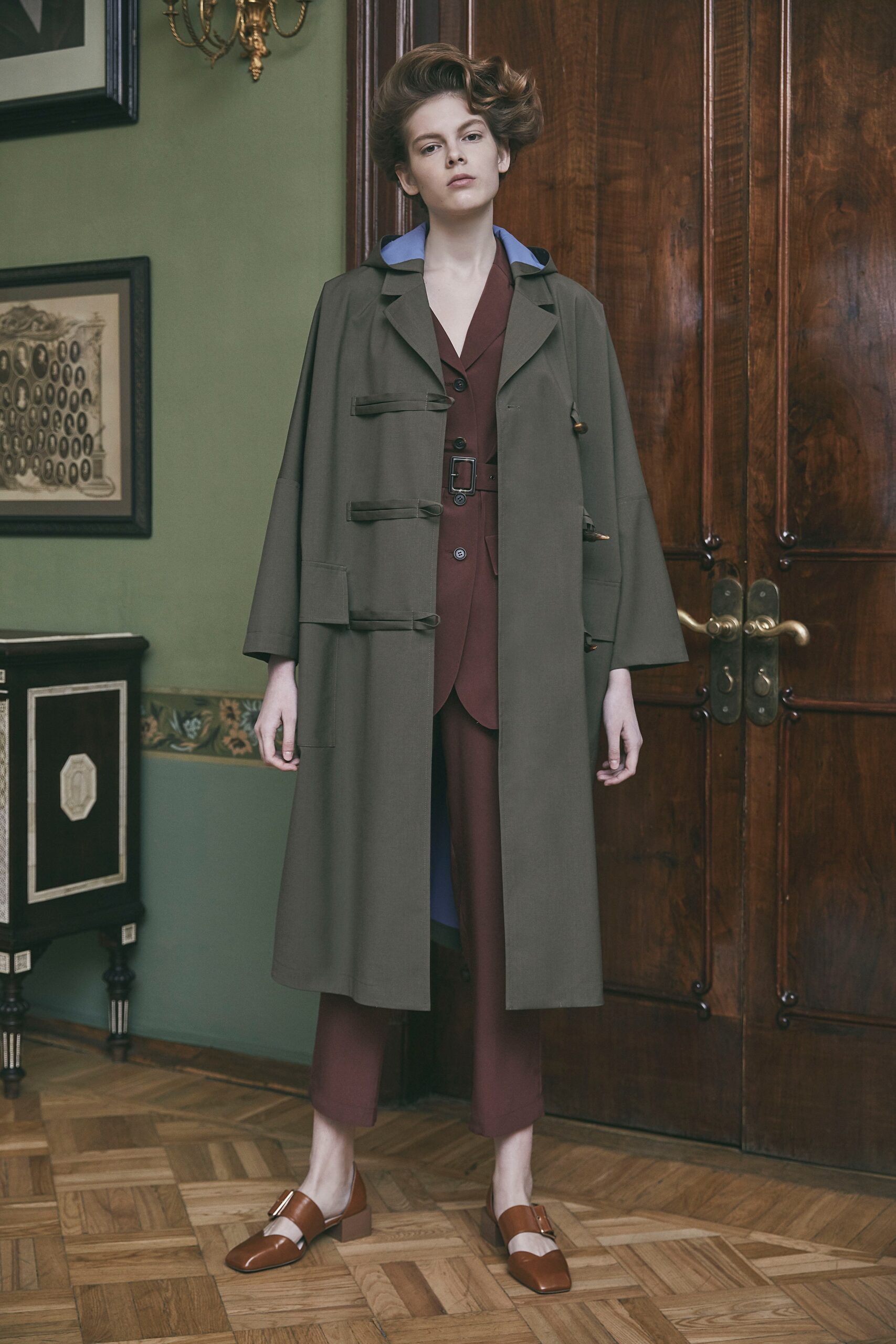 green coat with brown suit