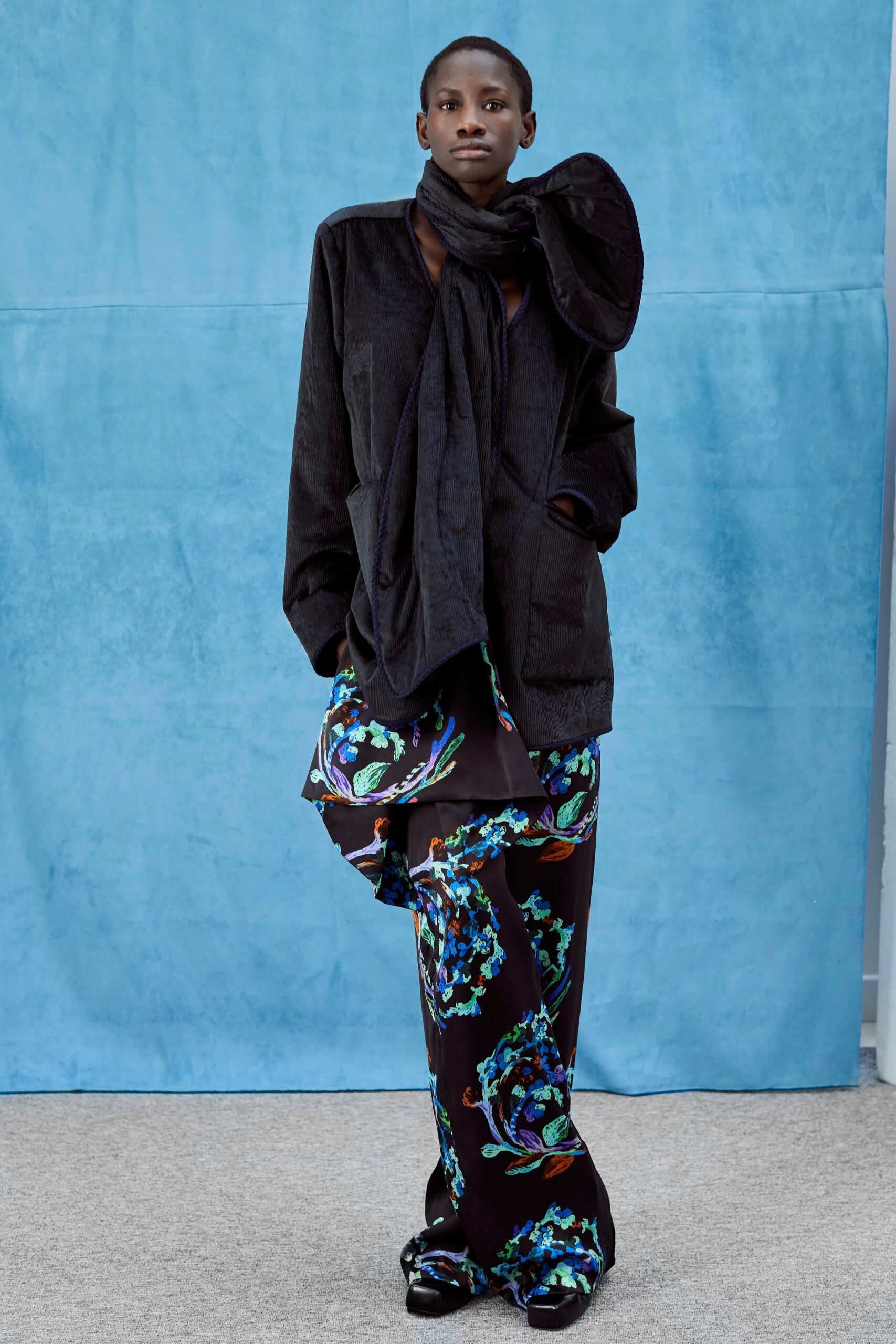 oversized black jacket with draped dress