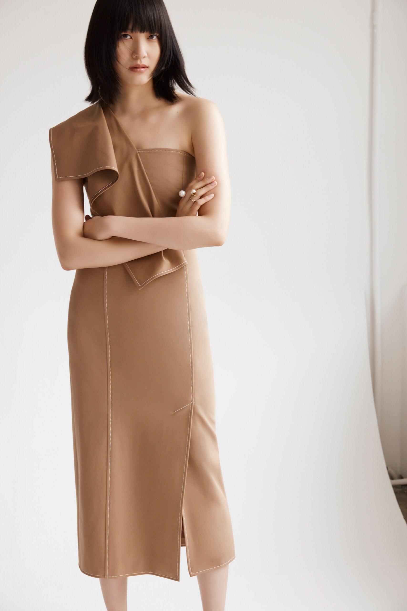 beige fitted asymmetric dress