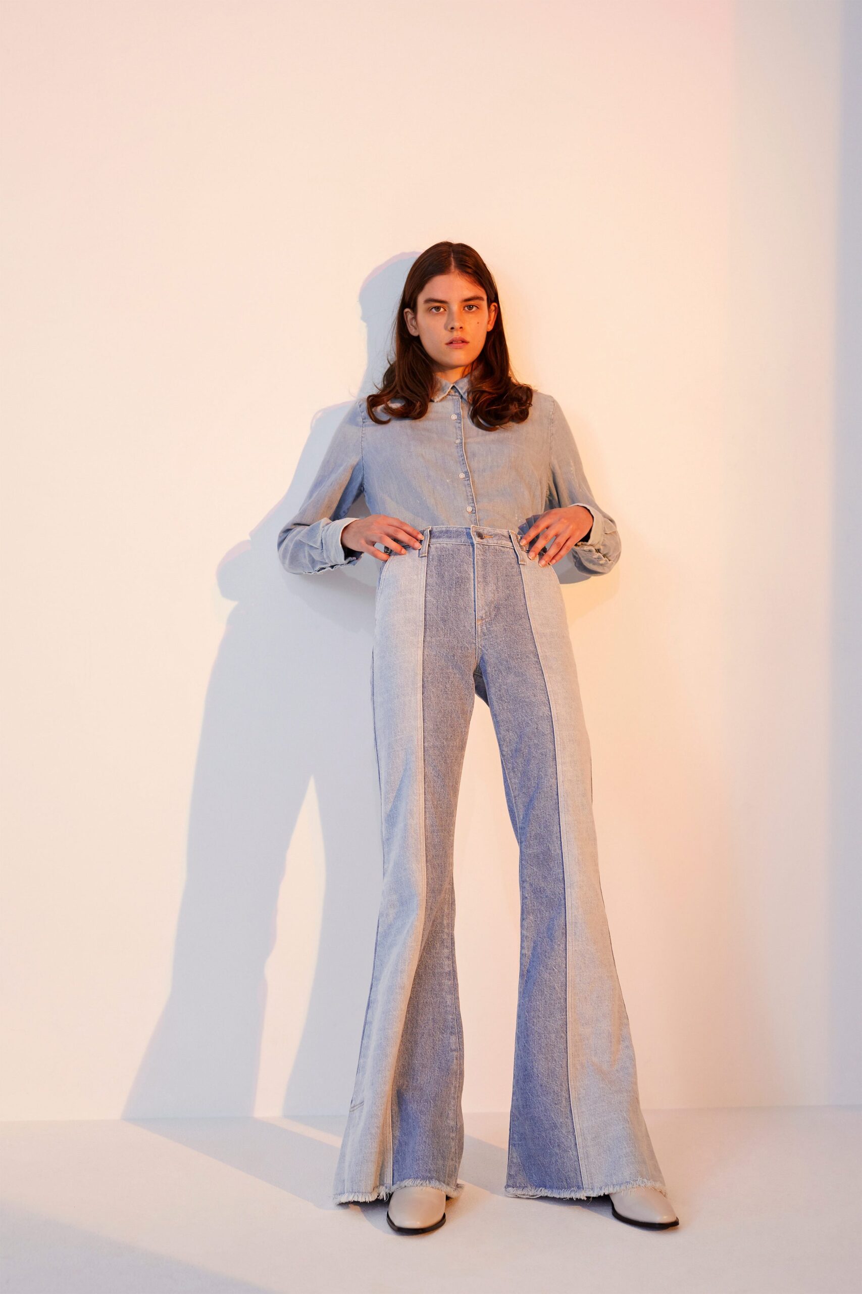 blue denim shirt and flared pants