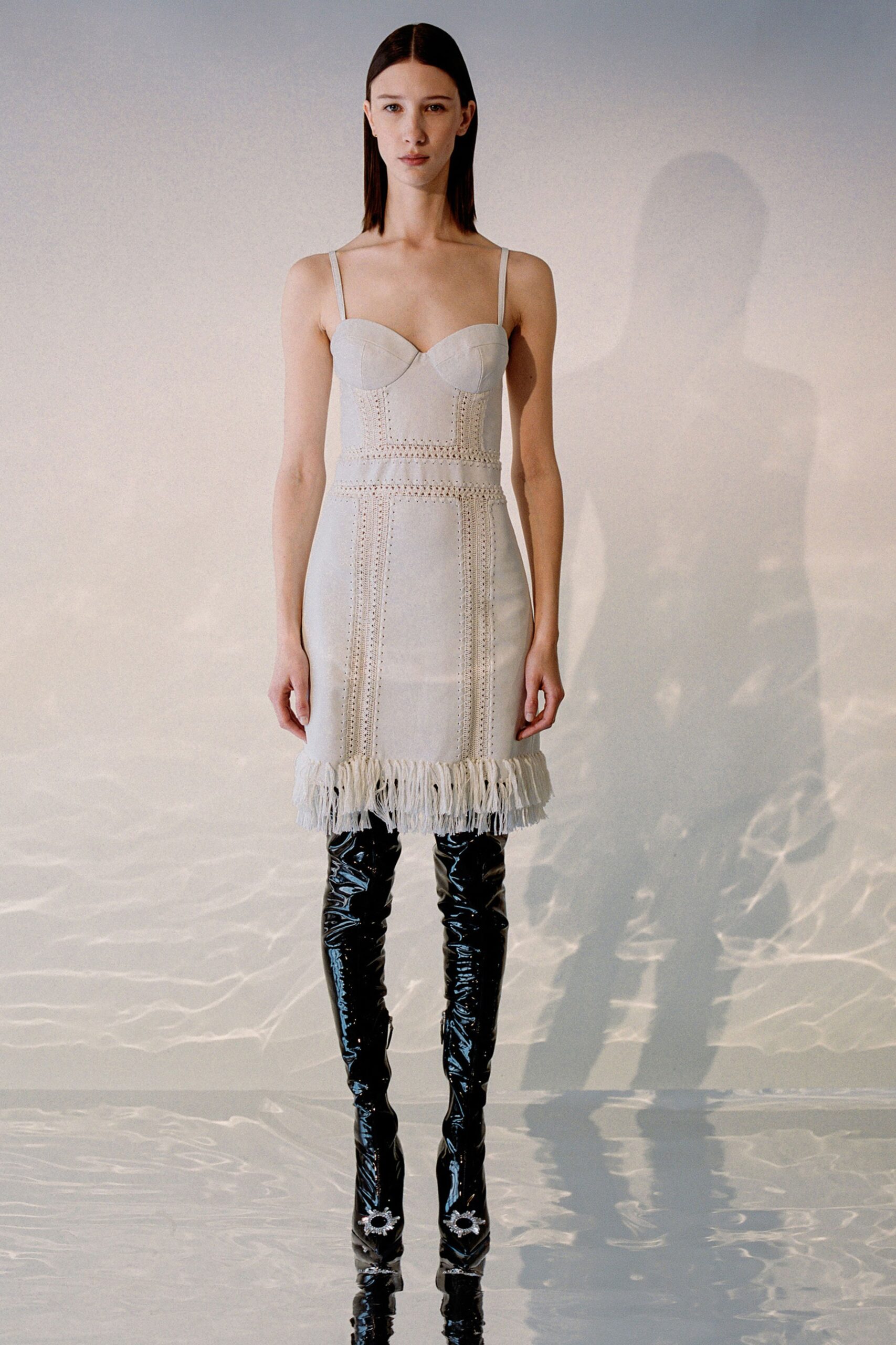 white fitted mini dress with fringes