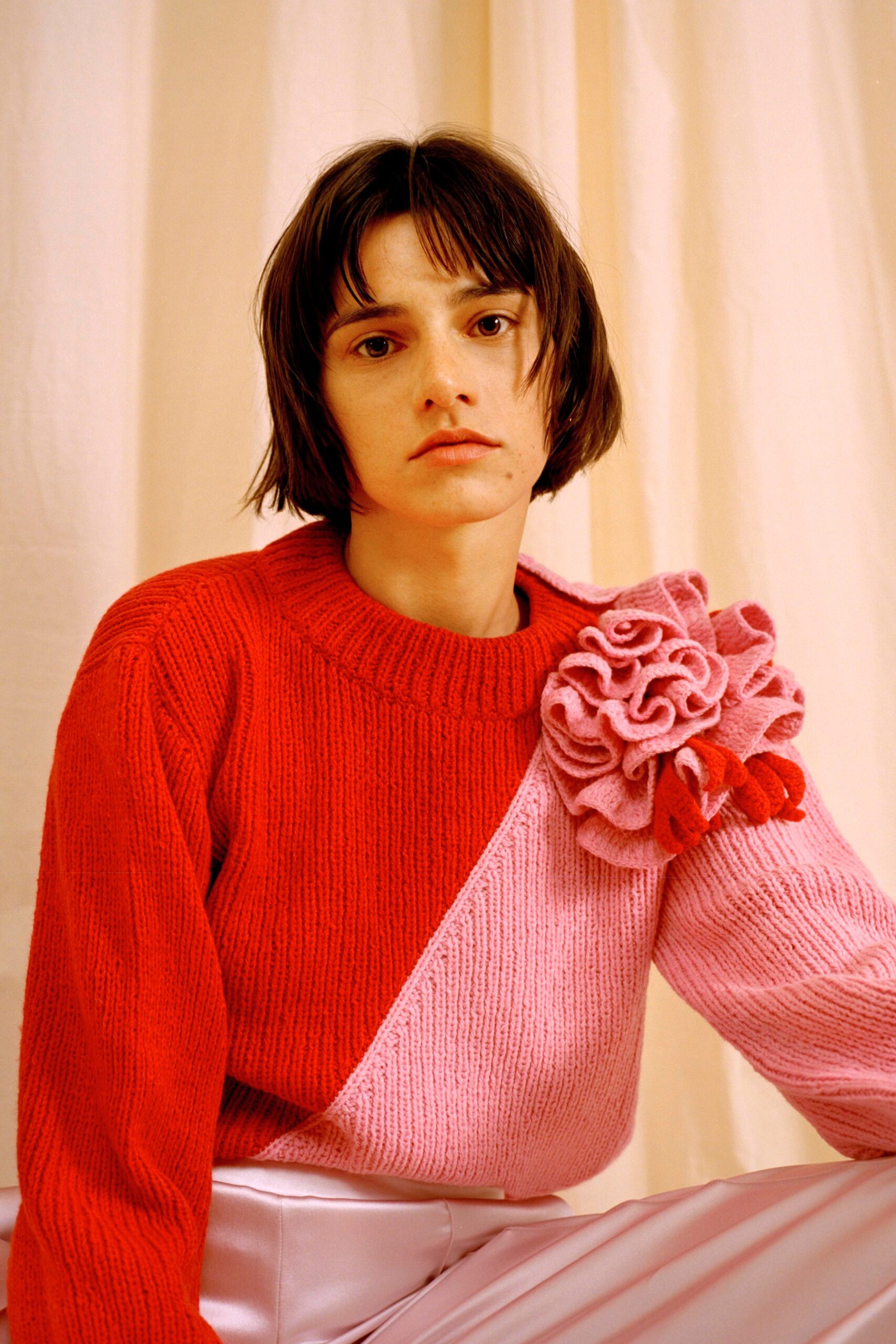 red wool long-sleeve collared fitted color-blocked ruffled sweater