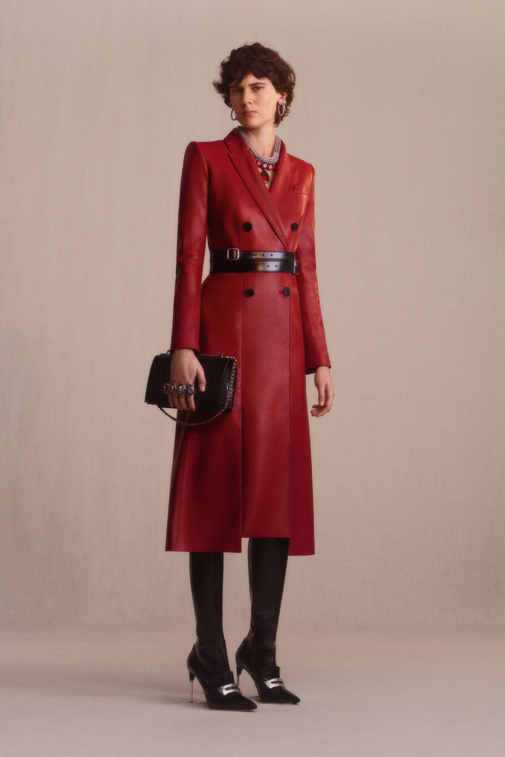 red leather long-sleeve collared fitted belted midi coat
