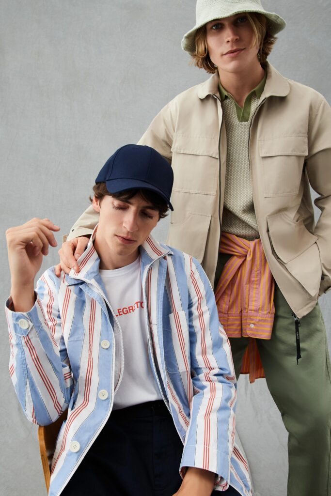 A relaxed blue and white striped jacket with long sleeves and a collared design.