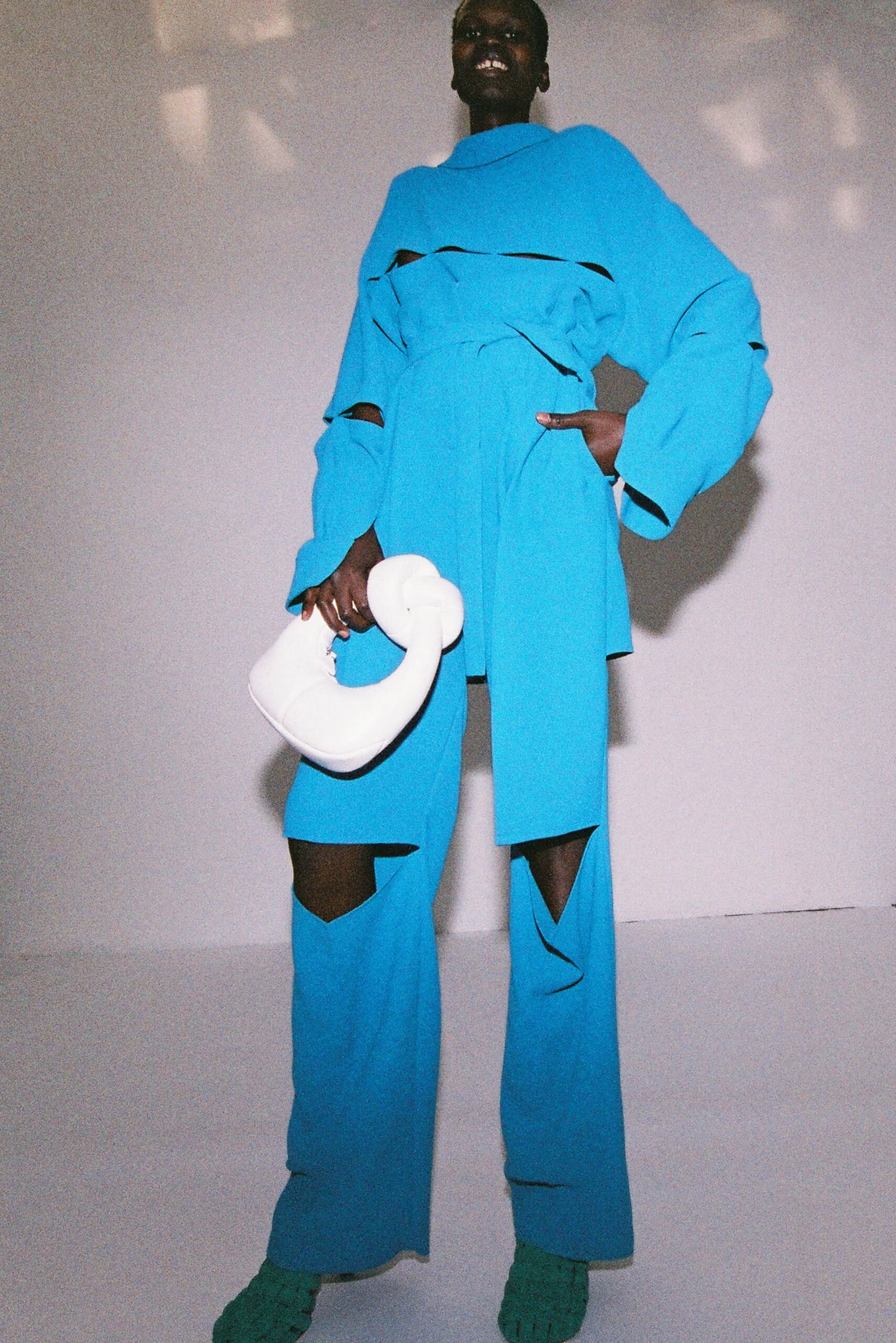 blue relaxed jumpsuit with cutouts