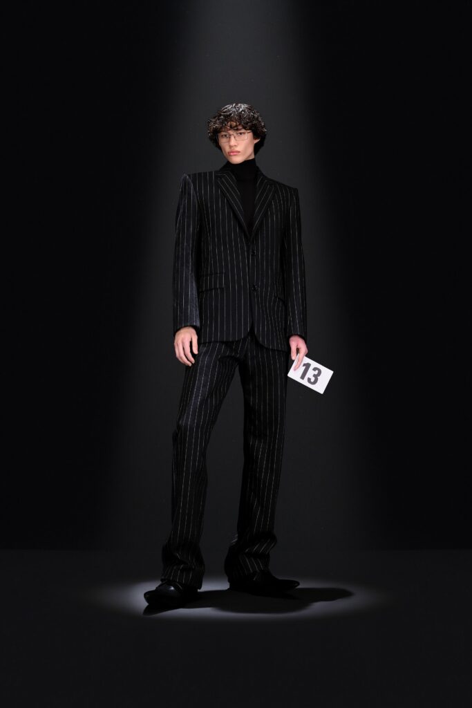 black tailored suit with turtleneck