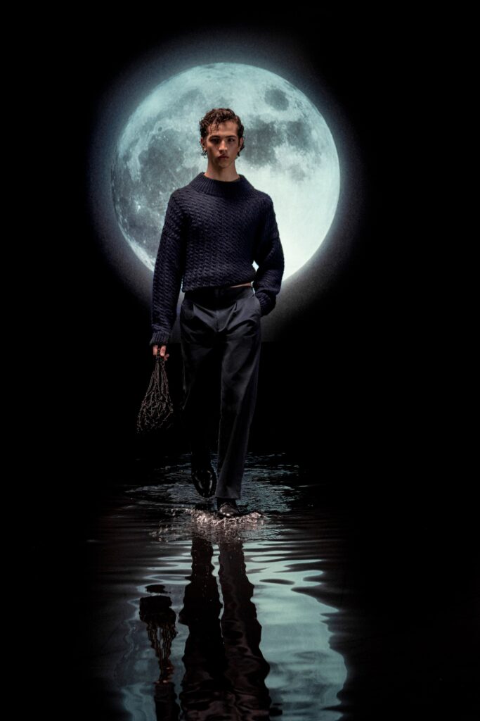 navy wool fitted sweater and black tailored pants