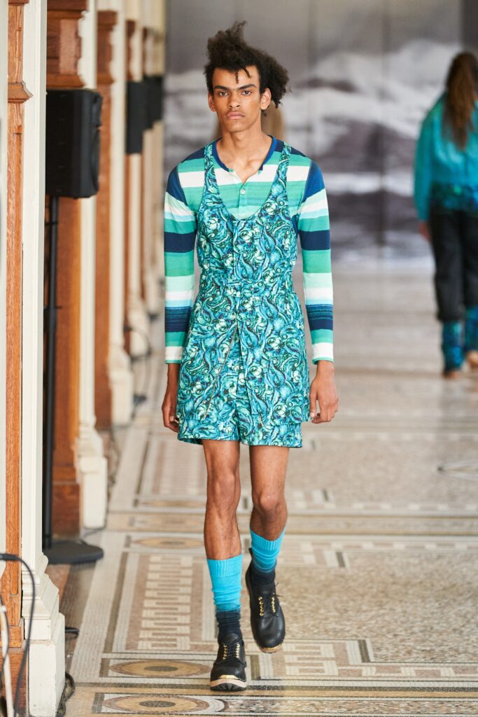 blue green printed romper with striped shirt