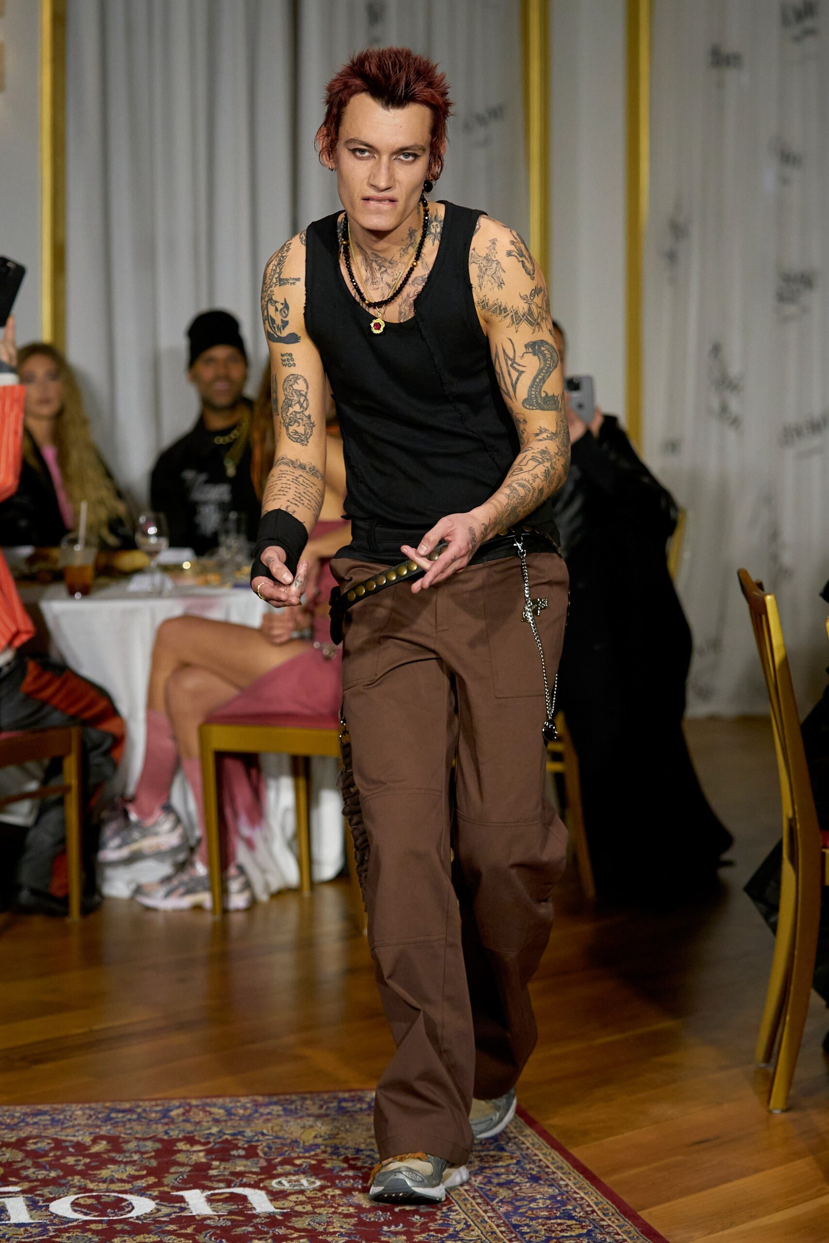 black tank-top and brown cargo pants