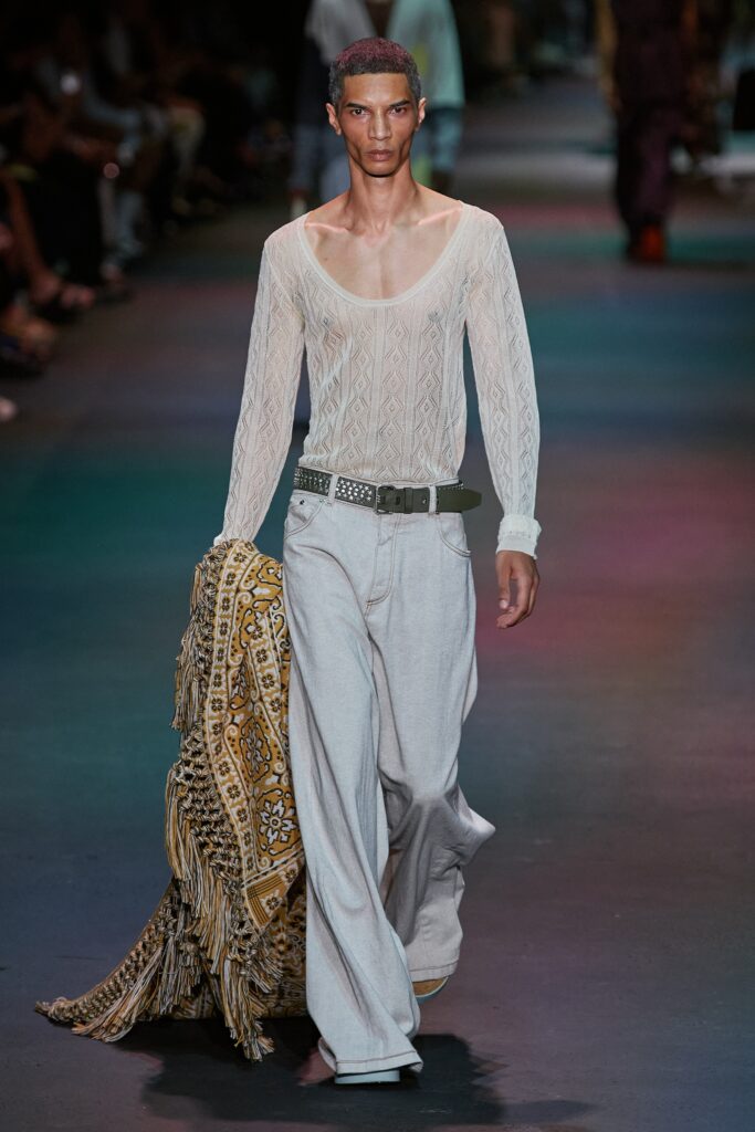 white textured top with gray pants