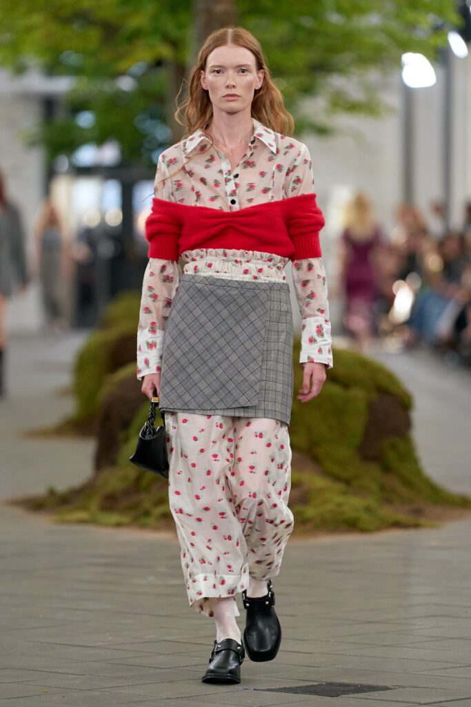 floral shirt red sweater gray skirt