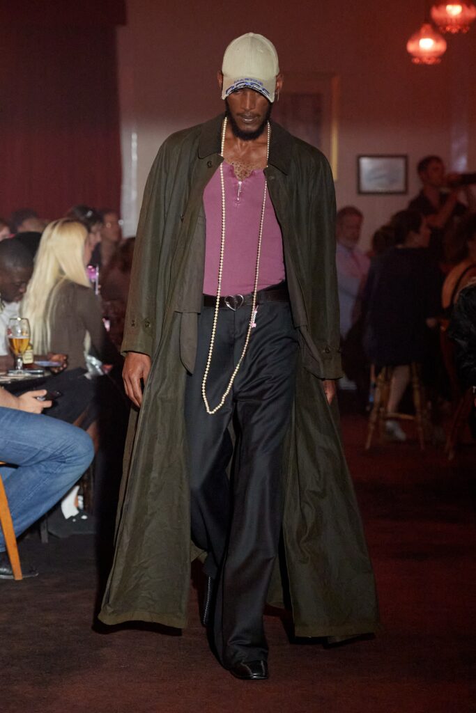 green coat with purple top