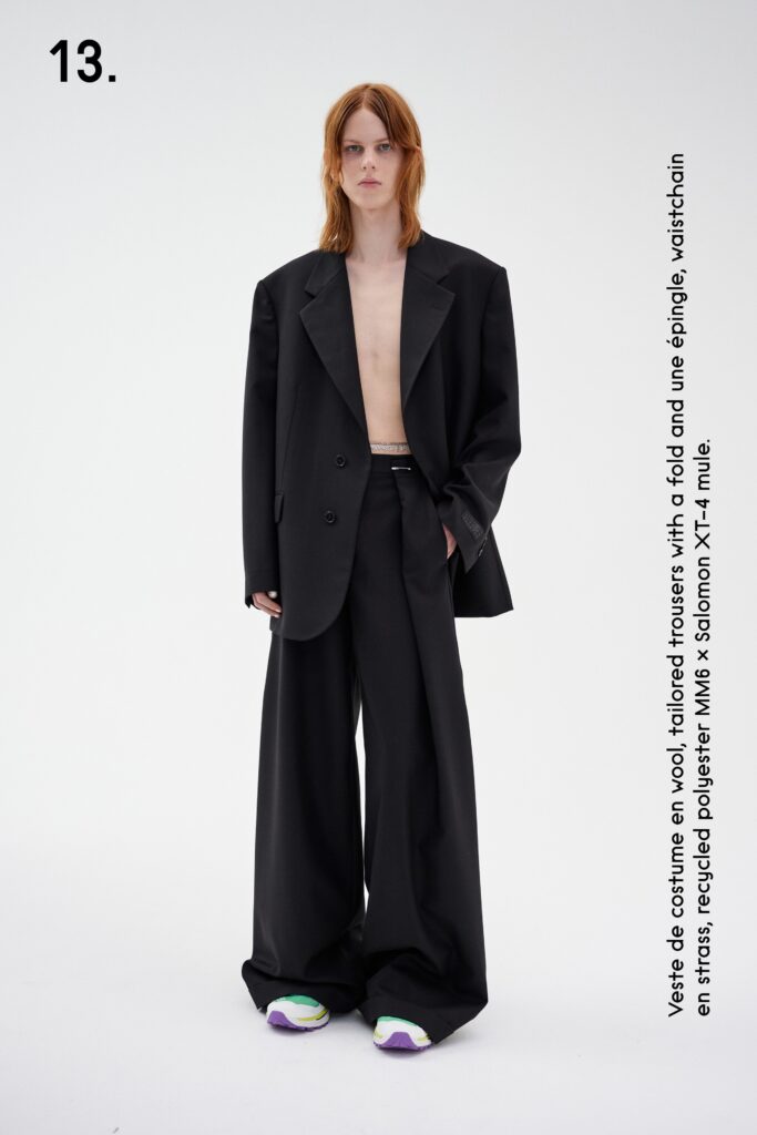 A relaxed black wool blazer paired with wide-leg trousers for a contemporary look.