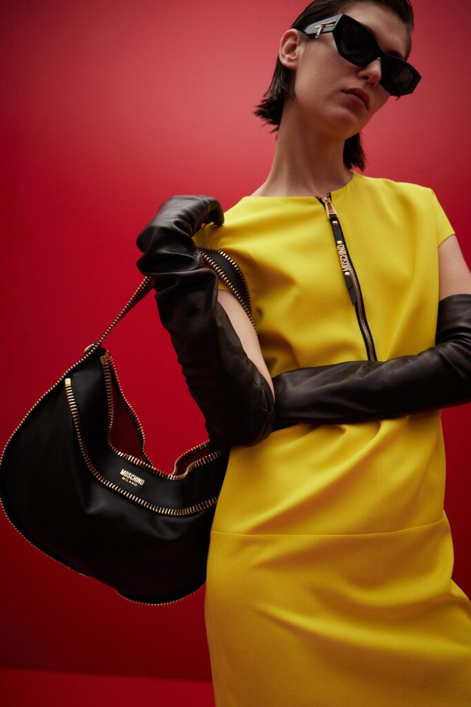fitted yellow dress with black accessories