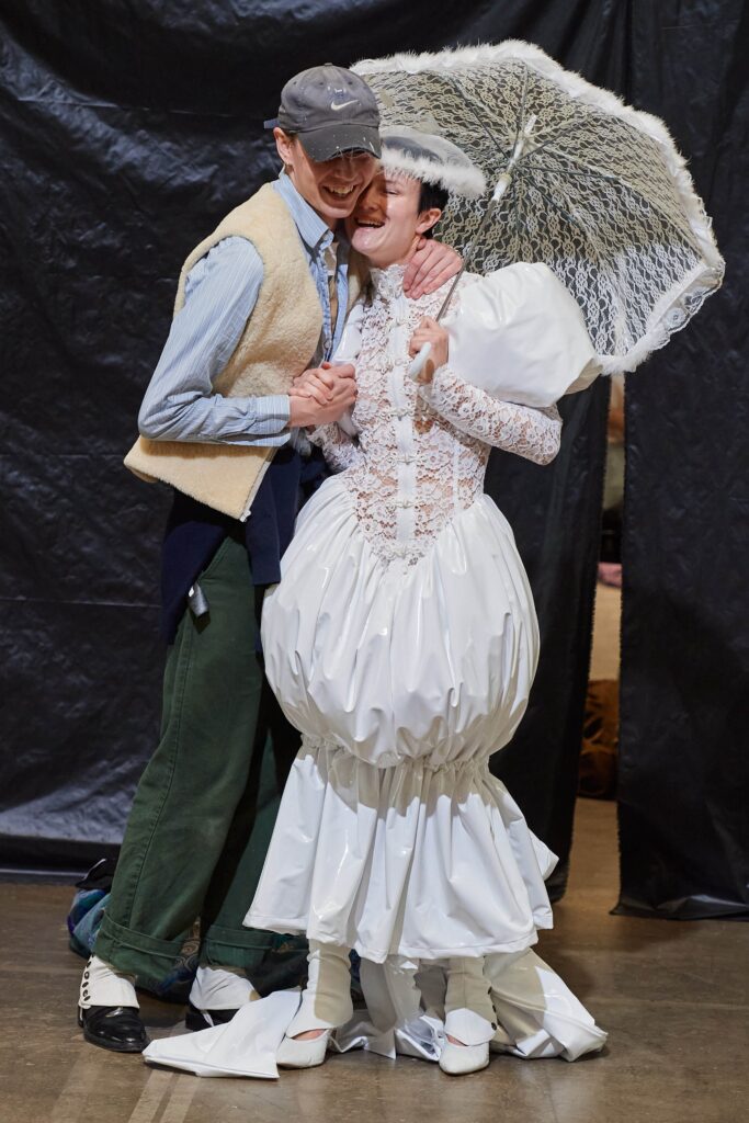 white vinyl midi dress with beige vest