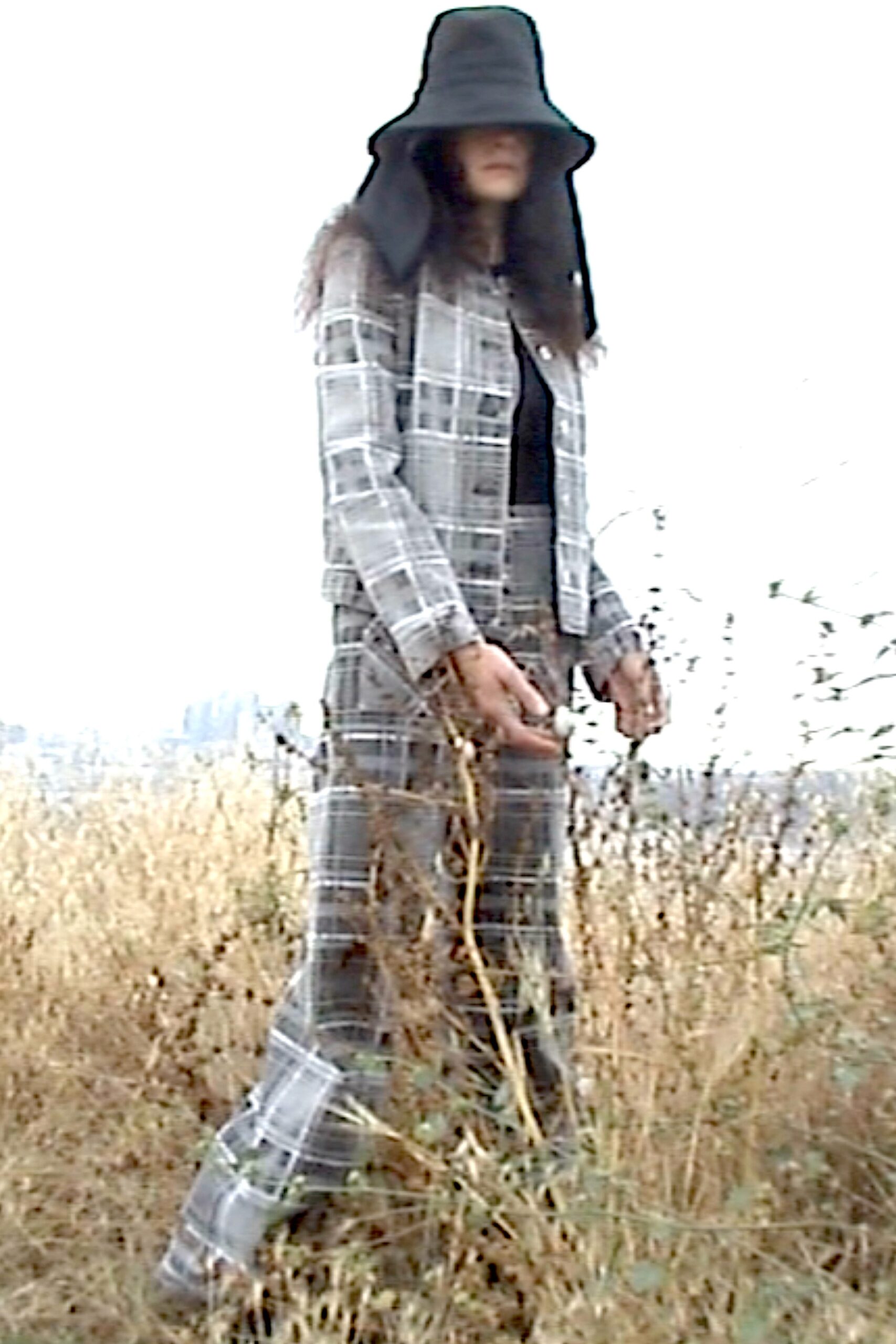 gray checked suit with black top