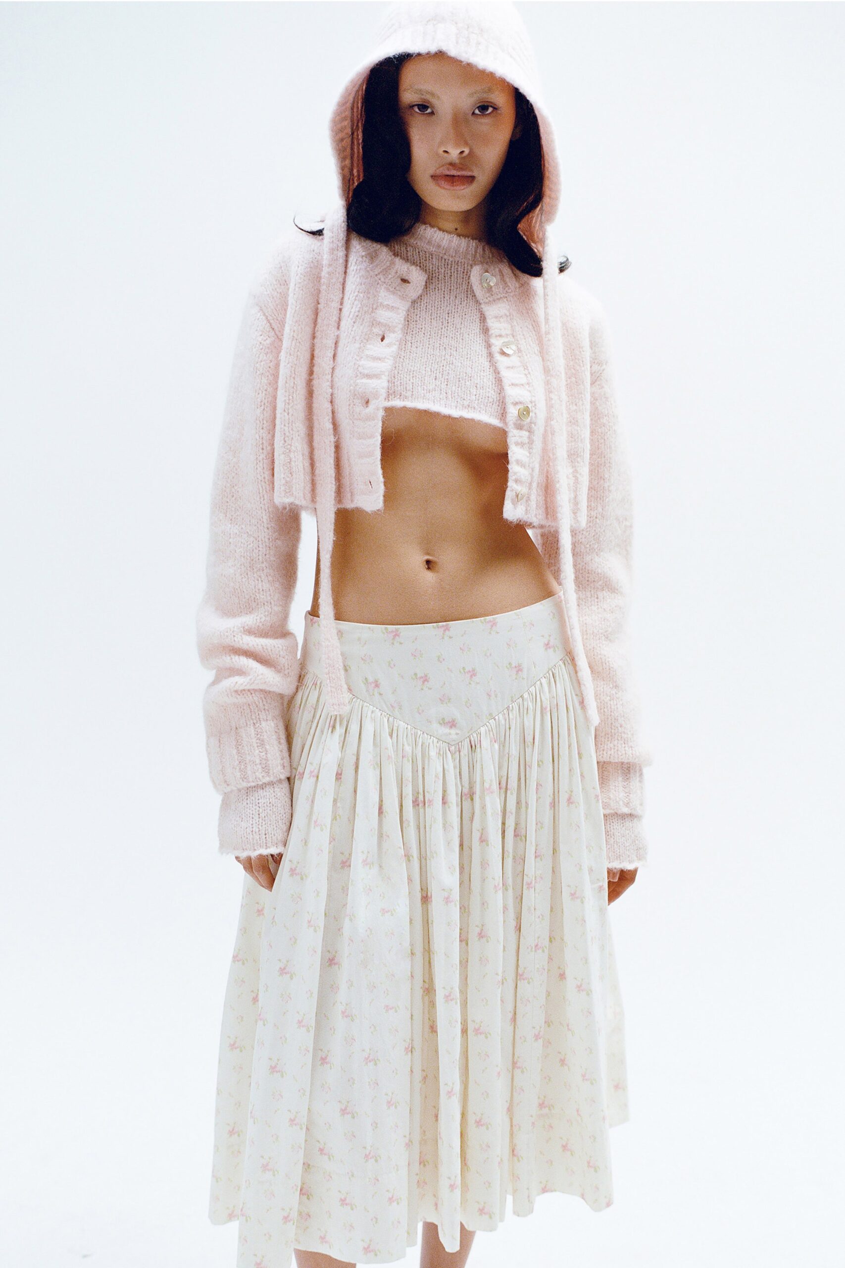 pink cardigan beige top midi skirt