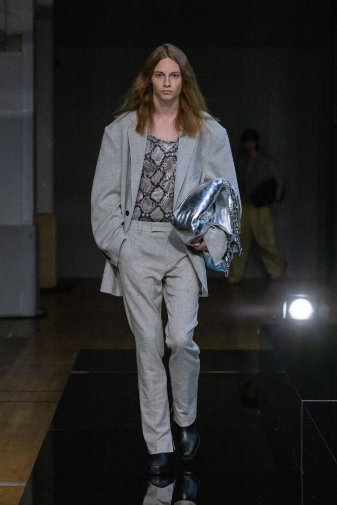 A relaxed gray printed jacket paired with matching pants, featuring a collared design.