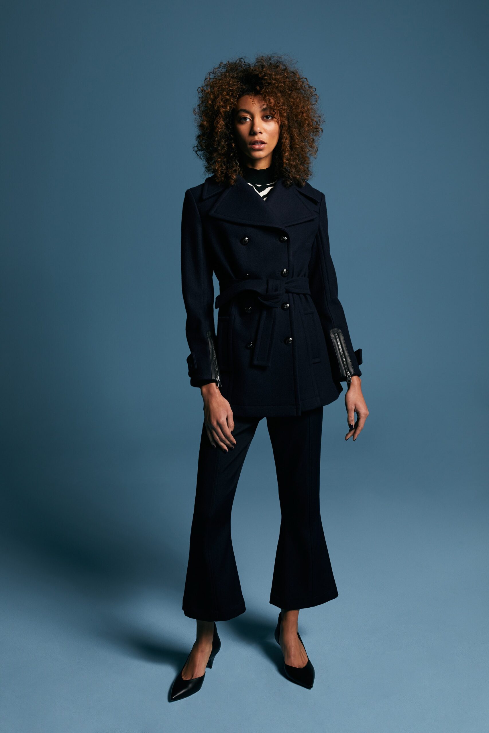black wool long-sleeve collared tailored belted jacket
